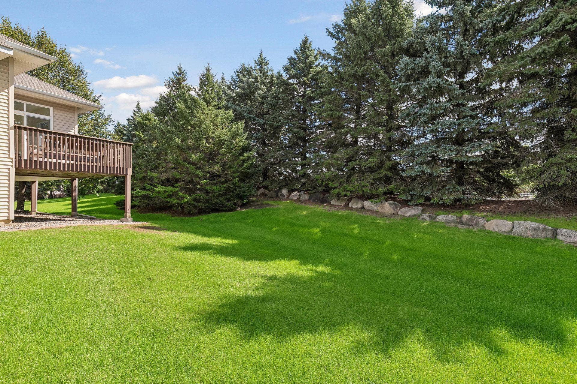 10381 Lancaster Cove, Woodbury, MN 55129 A massive private backyard space.