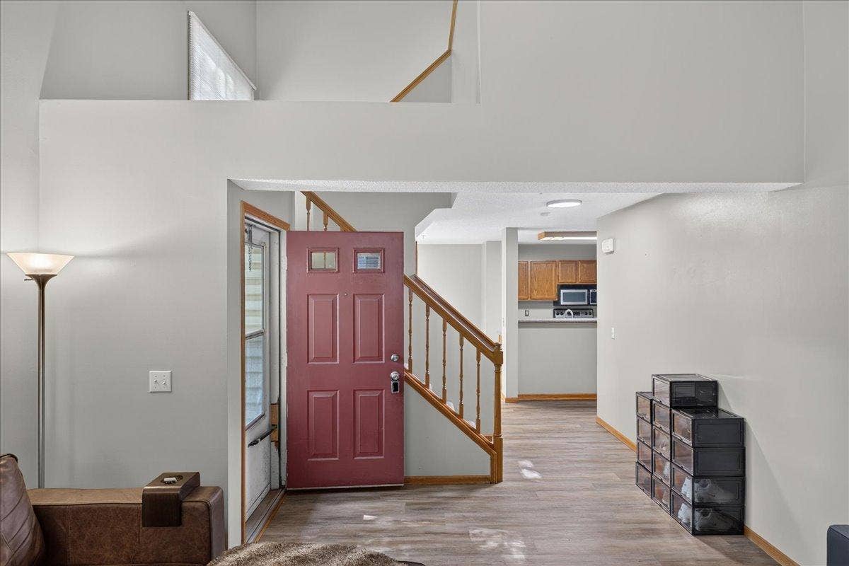 2583 Lockwood Drive, Mendota Heights, MN 55120 Freshly updated interior with new LVP flooring and an open, airy two-story design.