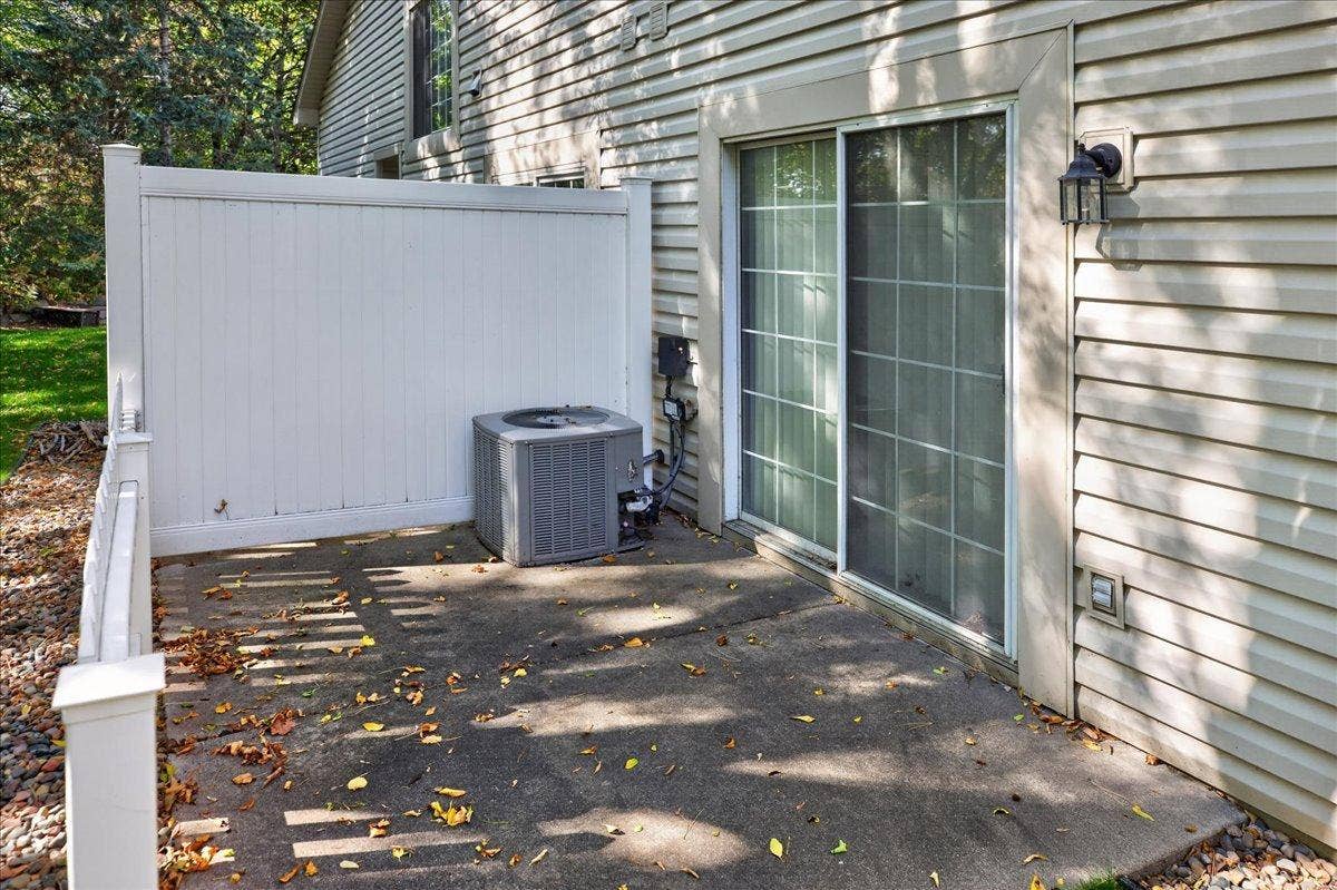 2583 Lockwood Drive, Mendota Heights, MN 55120 1. Patio access from the main level creates an inviting extension of the living space.