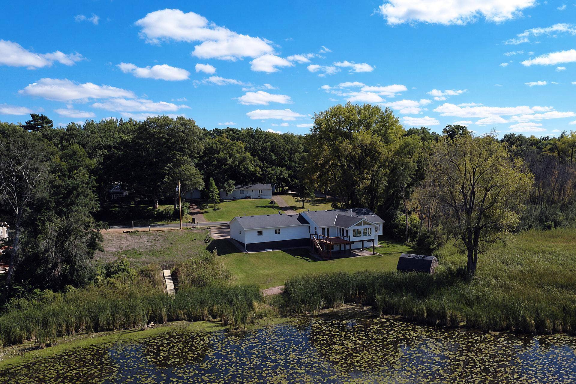 12056 Everton Avenue N, White Bear Lake, MN 55110 Aerial view of the home and lake