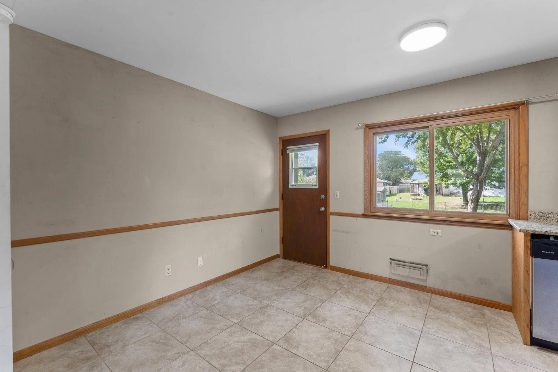 7001 Grimes Avenue N, Brooklyn Center, MN 55429 Eat In Kitchen Area With Door to the Rear of the Home
