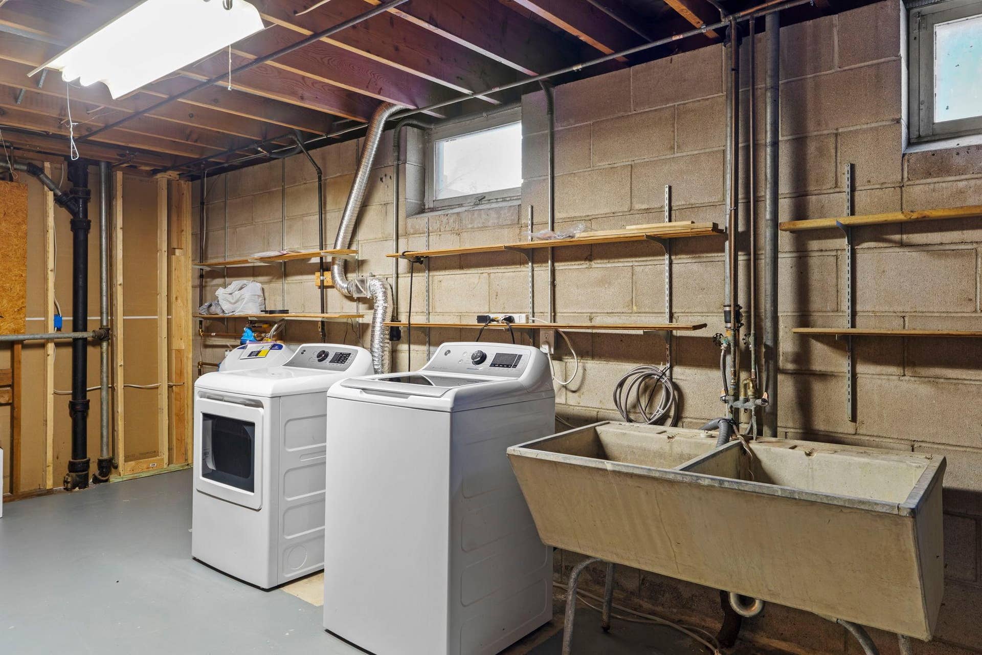 7001 Grimes Avenue N, Brooklyn Center, MN 55429 Clean and Dry Utility Room With Updated Washer and Dryer