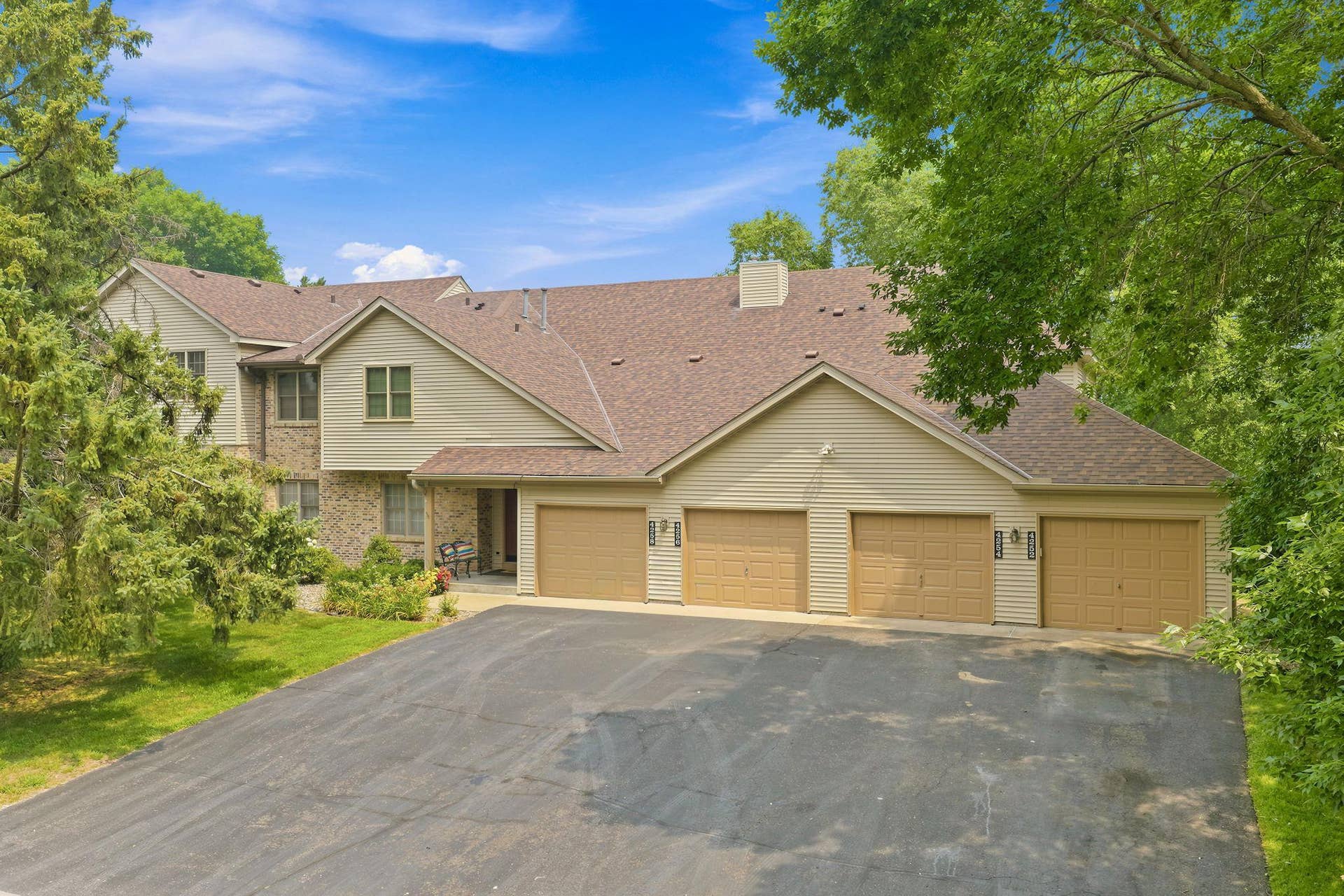 4254 Oakmede Lane, #87B, White Bear Lake, MN 55110 Best location in the Development backs up to Rice Lake Wetlands with Wildlife Galore! And notice plenty of off street parking space outside of Single Stall Garage!