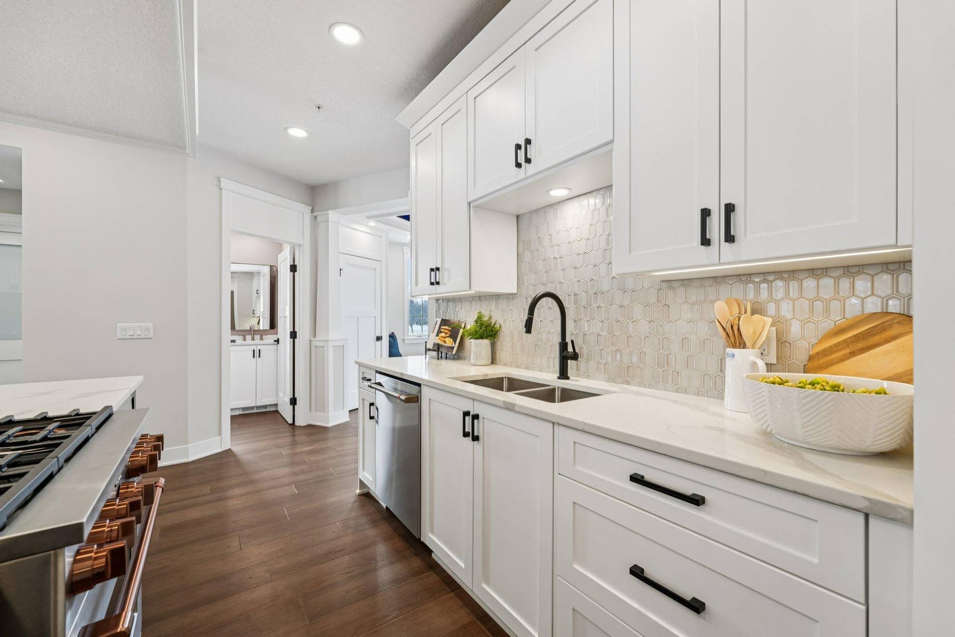 Beautifully finished cabinetry, modern fixtures, and premium surfaces highlight the quality and craftsmanship throughout the kitchen.