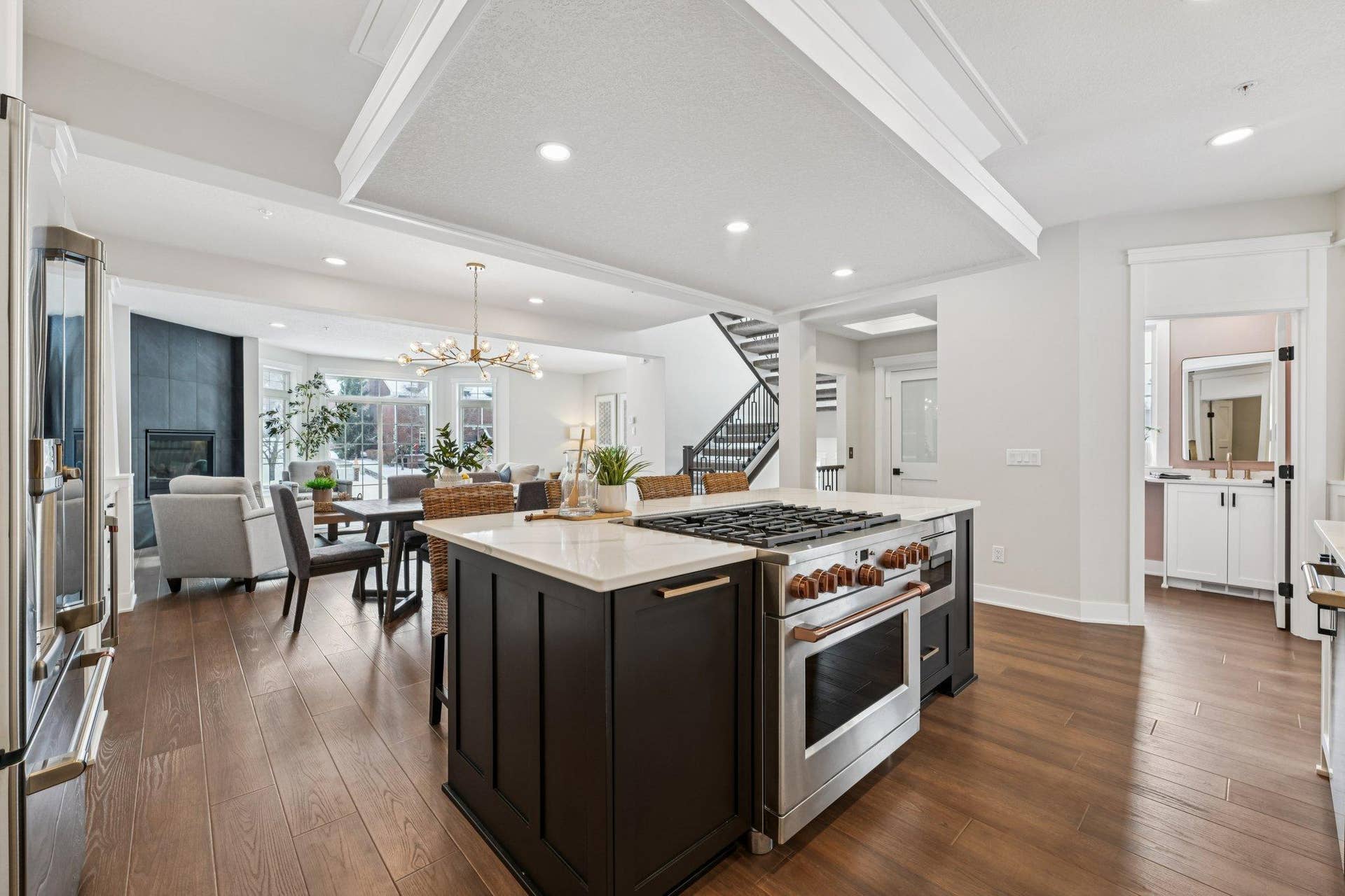 Kitchen and prep areas flow effortlessly into the living room, creating a cohesive space designed for modern living.