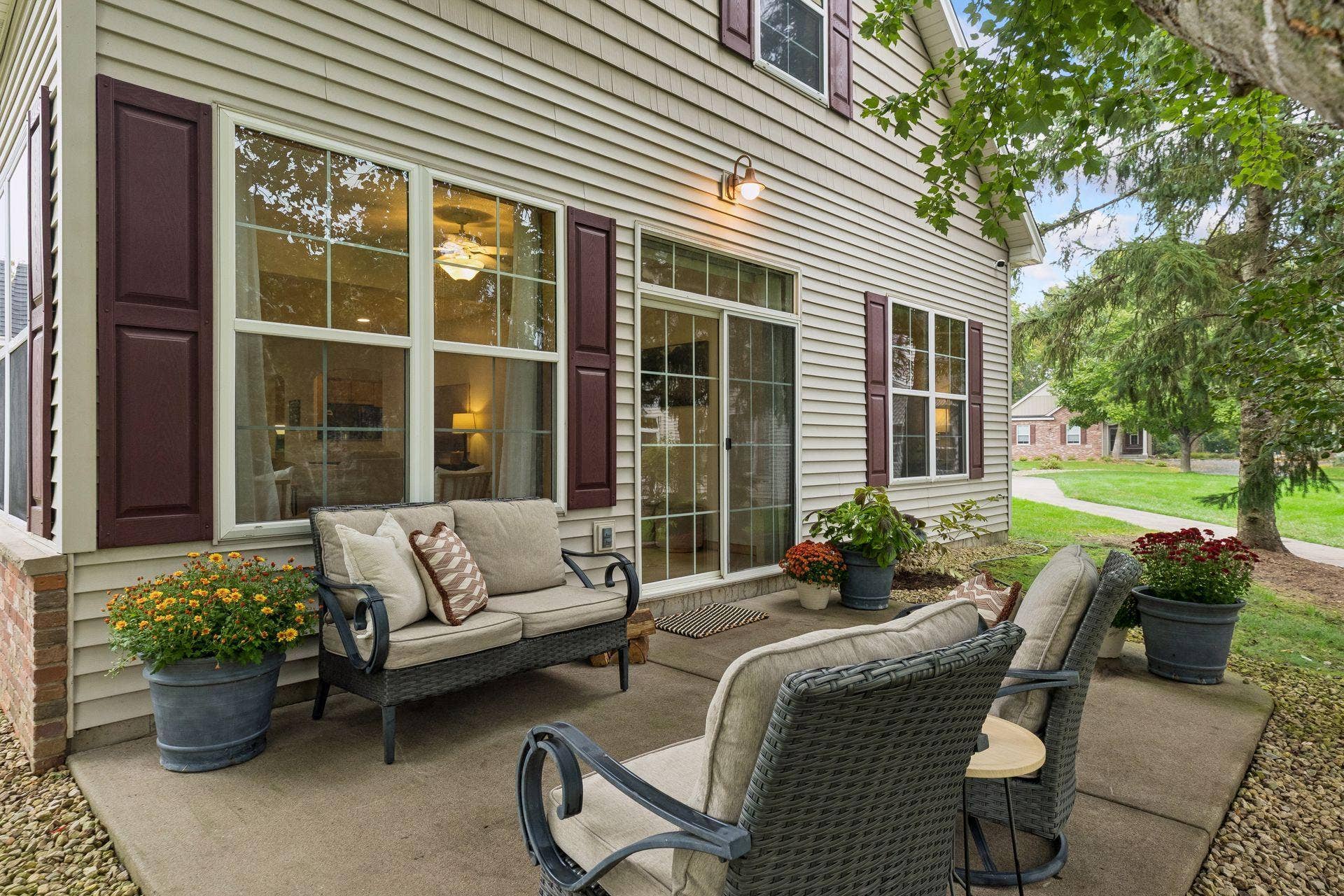 10571 Mississippi Circle N, Brooklyn Park, MN 55443 The patio has ample space for a grill and entertaining family and friends. It also wraps around to a large yard space with a gazebo for even more space to entertain. Note the windows and patio door that fill the interior with natural light.