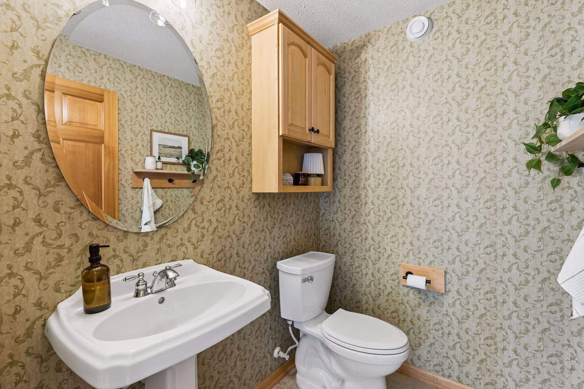 10571 Mississippi Circle N, Brooklyn Park, MN 55443 Half bath off main living area is handy for family and guests alike.