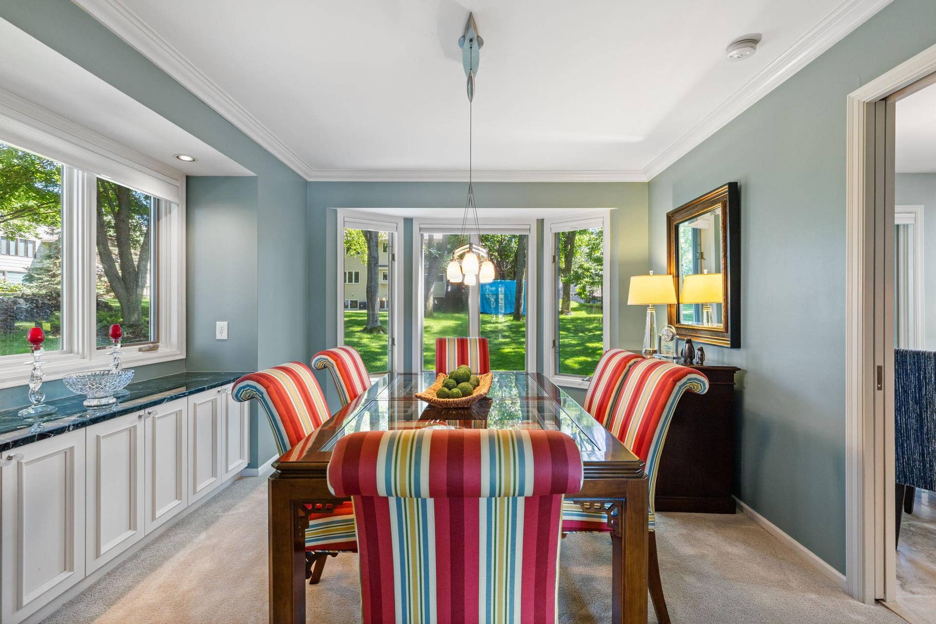 15393 Shadow Creek Road, Maple Grove, MN 55311 The separate formal dining room adds even more versatility with detailed trim, added counterspace, and cabinetry.