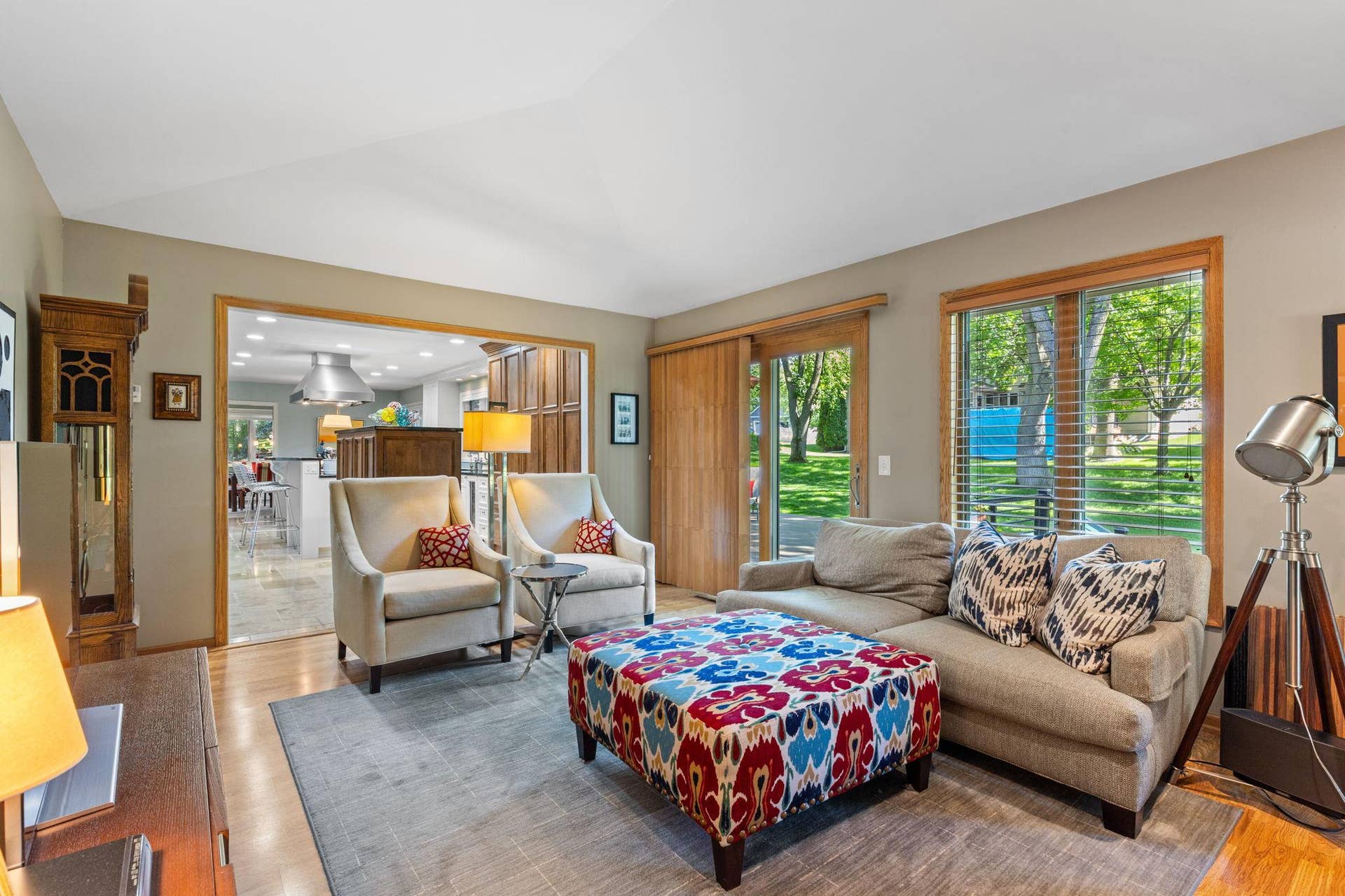 15393 Shadow Creek Road, Maple Grove, MN 55311 The family room is a favorite spot in the home with hardwood flooring, vaulted ceilings, and oversized windows overlooking the backyard and greenspace.