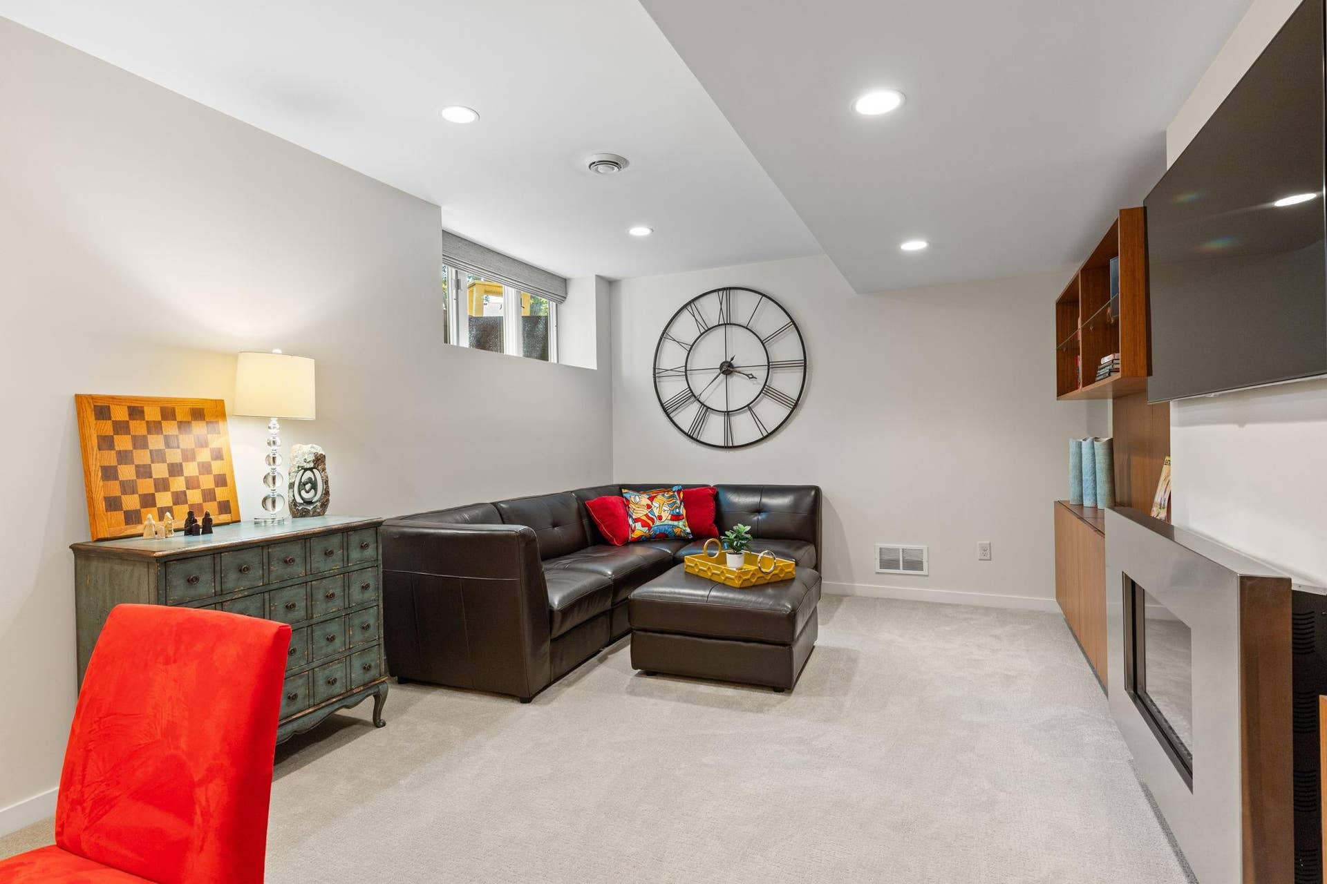 15393 Shadow Creek Road, Maple Grove, MN 55311 The large recreation room features built-ins surrounding a fireplace.