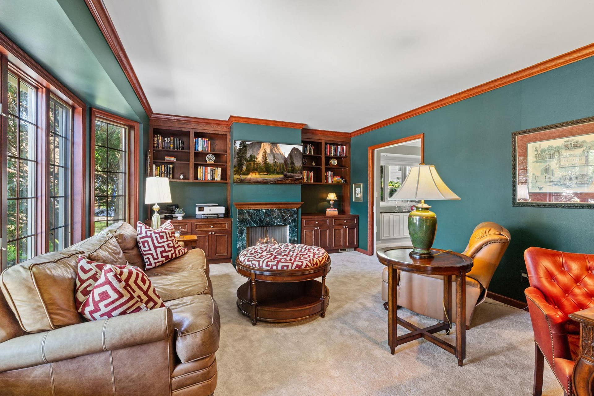15393 Shadow Creek Road, Maple Grove, MN 55311 A gas fireplace creates the perfect gathering spot during the colder months, while the surrounding details give the room a comfortable yet refined feel.