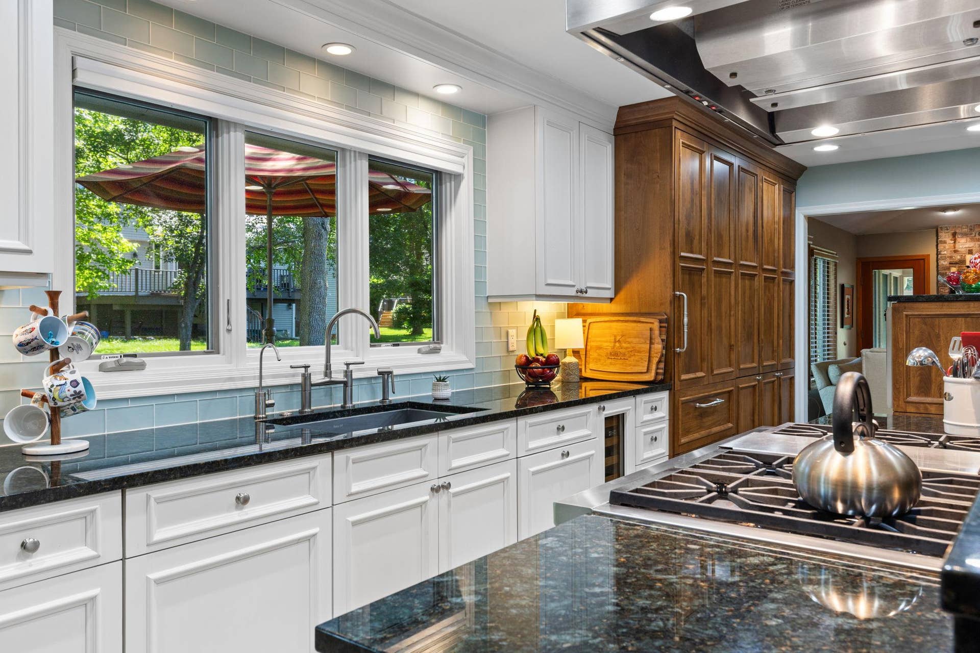 15393 Shadow Creek Road, Maple Grove, MN 55311 Two-tone cabinetry, soft-close drawers, and designated beverage fridge!