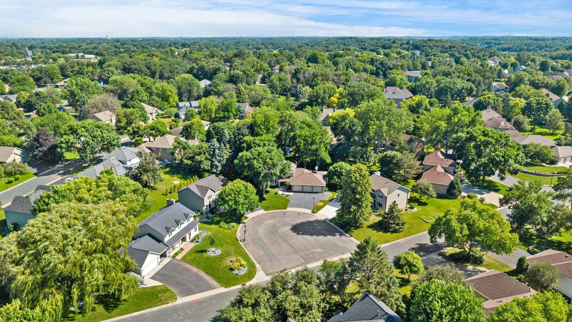15393 Shadow Creek Road, Maple Grove, MN 55311 This property offers a wonderful combination of character, spacious living areas, beautiful finishes, and a peaceful backyard setting, all in a location close to local lakes, parks, schools, Elm Creek, and the Shoppes at Arbor Lakes.