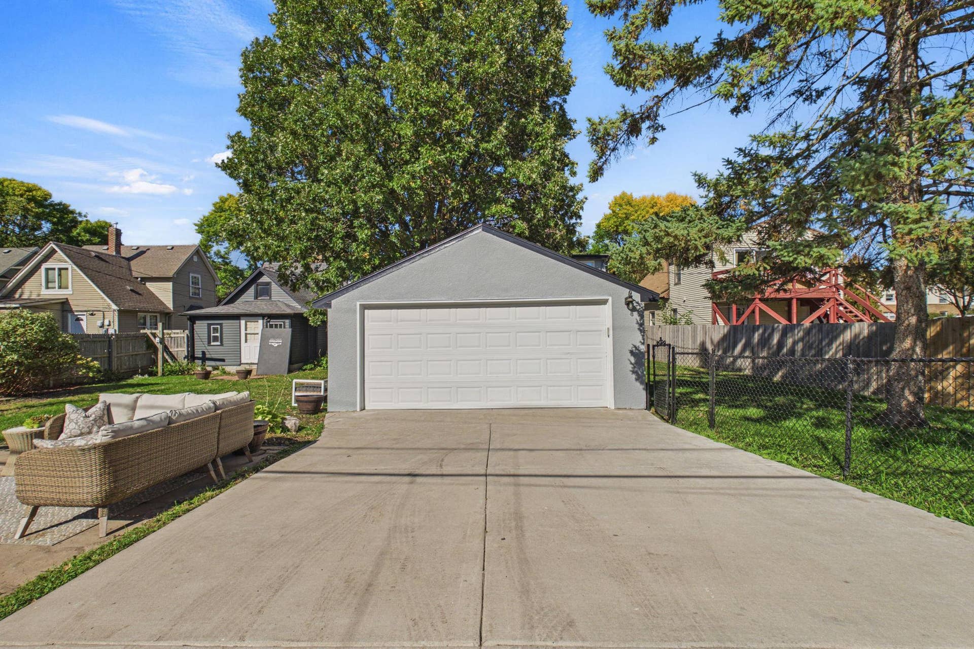 186 Hurley Street E, West Saint Paul, MN 55118 Newer concrete driveway leaving to the detached two car garage