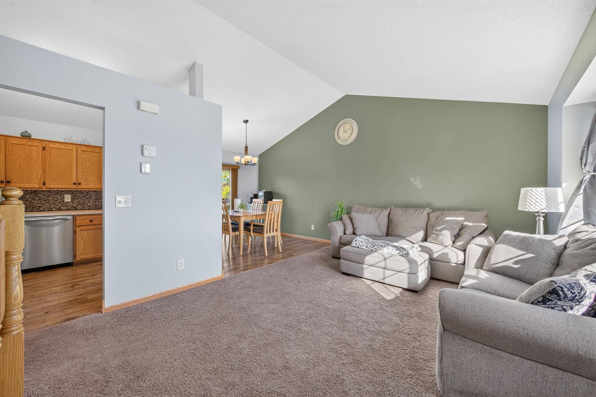 3765 Woodside Drive, Monticello, MN 55362 Just a half a level up you have a bright and spacious living room with vaulted ceiling and an open flow to the kitchen and dining area.