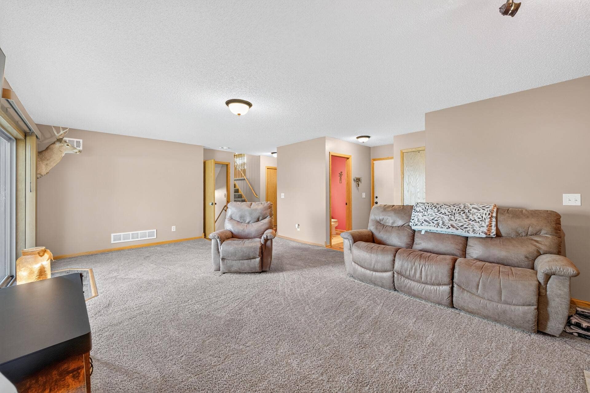 3765 Woodside Drive, Monticello, MN 55362 Expansive main-level family room offers plenty of space for comfortable everyday living and entertaining. Such a great space.