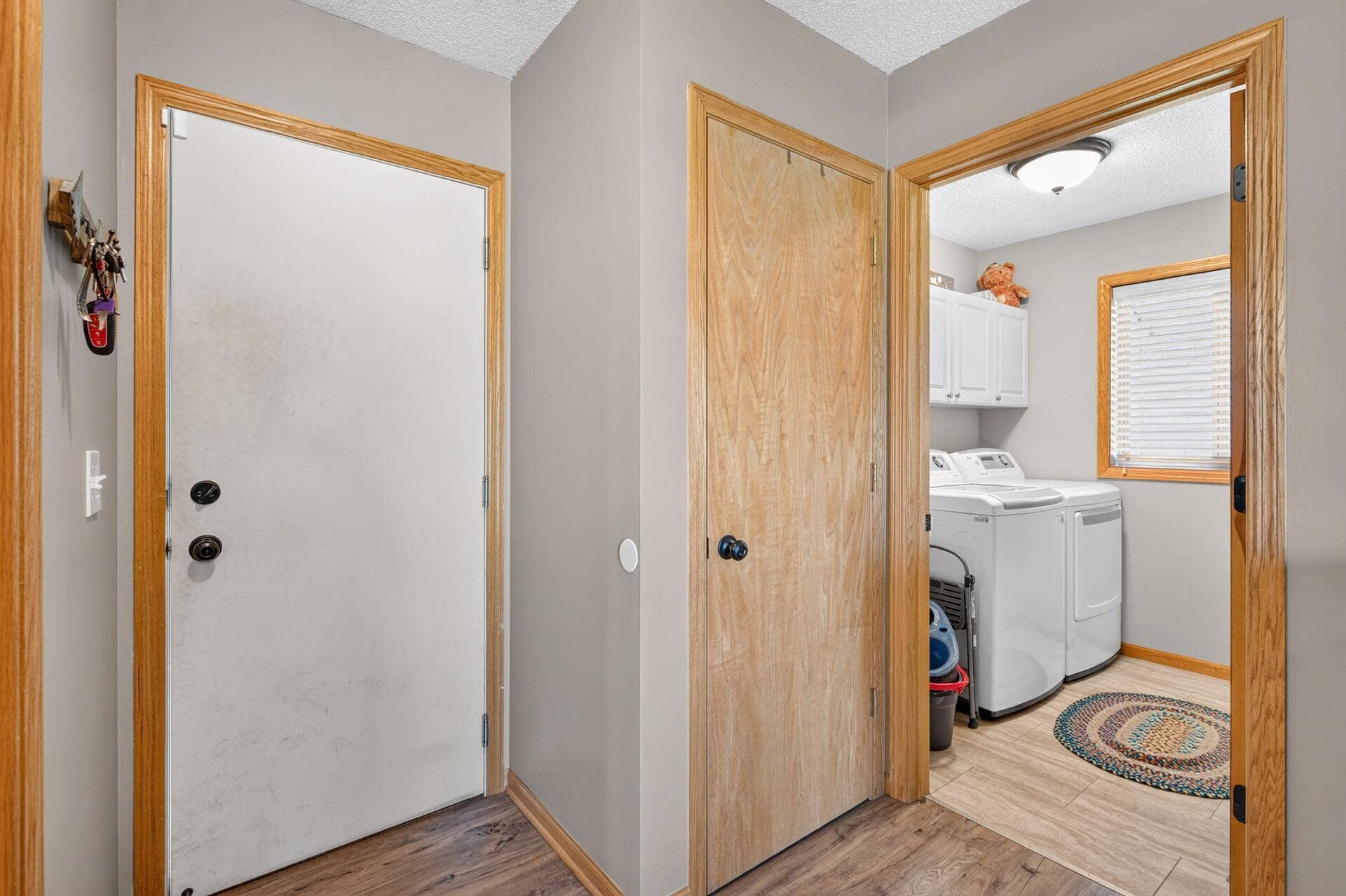 3765 Woodside Drive, Monticello, MN 55362 Main level laundry room and service door to garage.