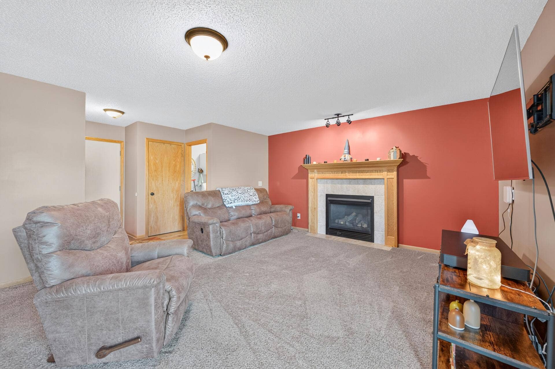 3765 Woodside Drive, Monticello, MN 55362 Cozy main-level family room centered around a beautiful gas fireplaceperfect for relaxing or entertaining.