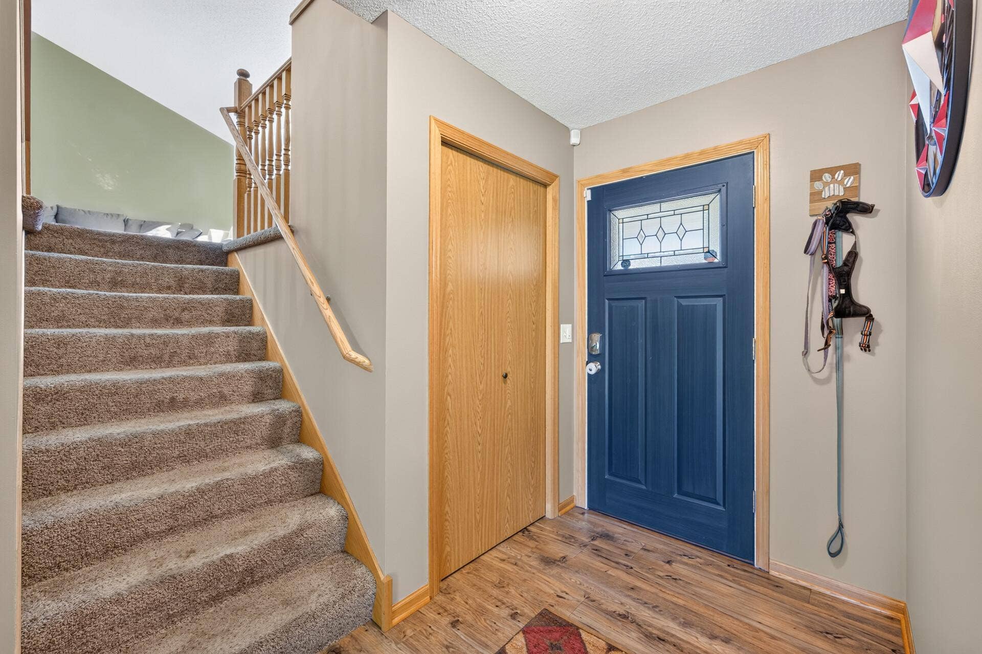 3765 Woodside Drive, Monticello, MN 55362 Welcoming entryway with updated flooring and convenient coat closet.
