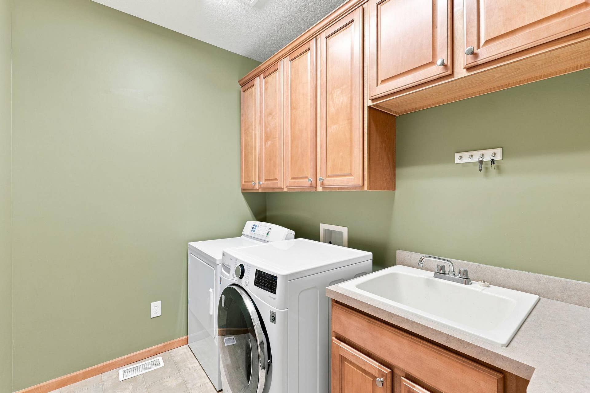 7143 Arthur Drive, Woodbury, MN 55125 Main floor laundry room.