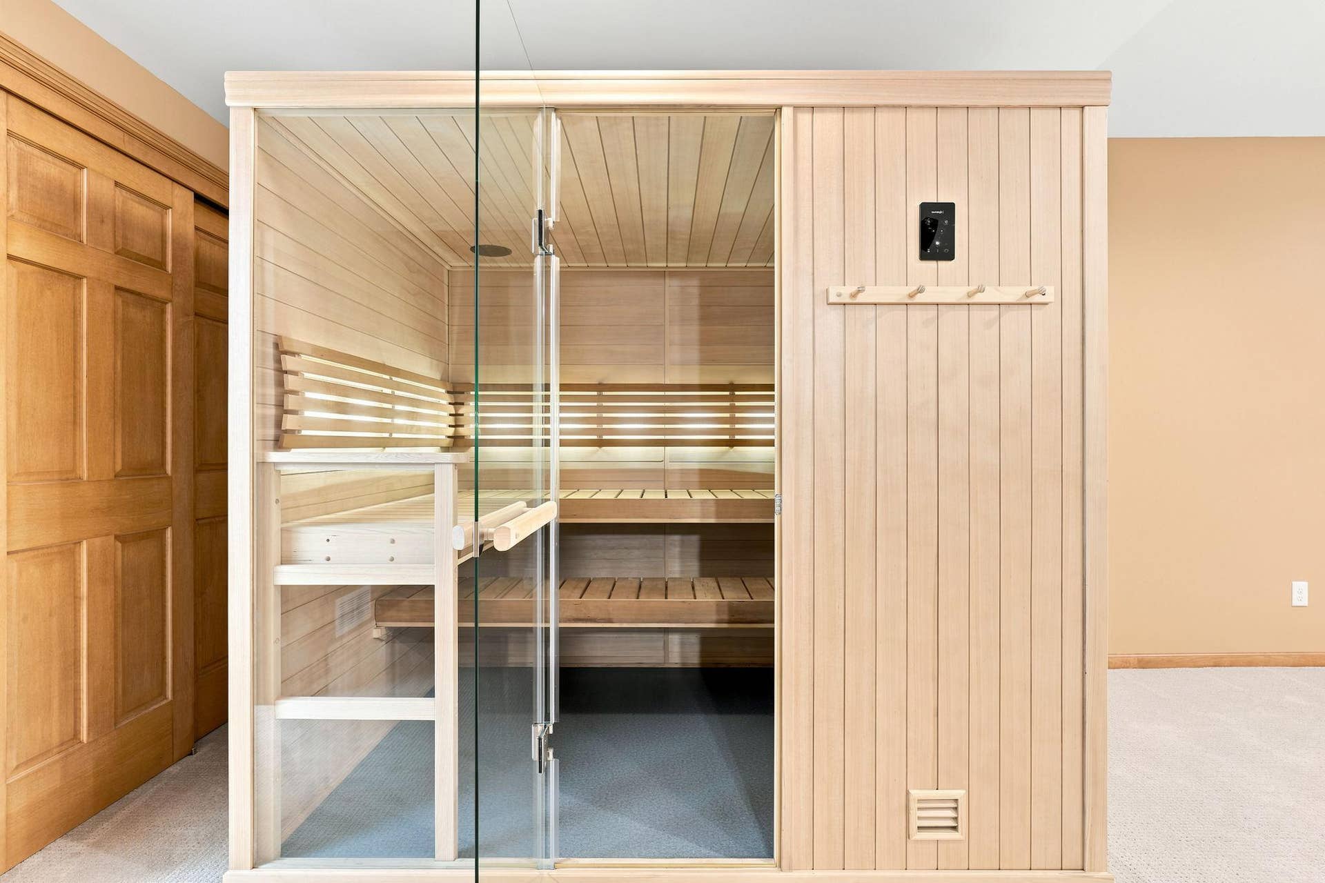 7143 Arthur Drive, Woodbury, MN 55125 This gorgeous Finnleo Hallmark 57 sauna was purchased in 2020. It comfortably seats 4-5 people and is included in sale! Sellers will also remove if buyer prefers. A third bedroom could be added to the lower level adding instant value.