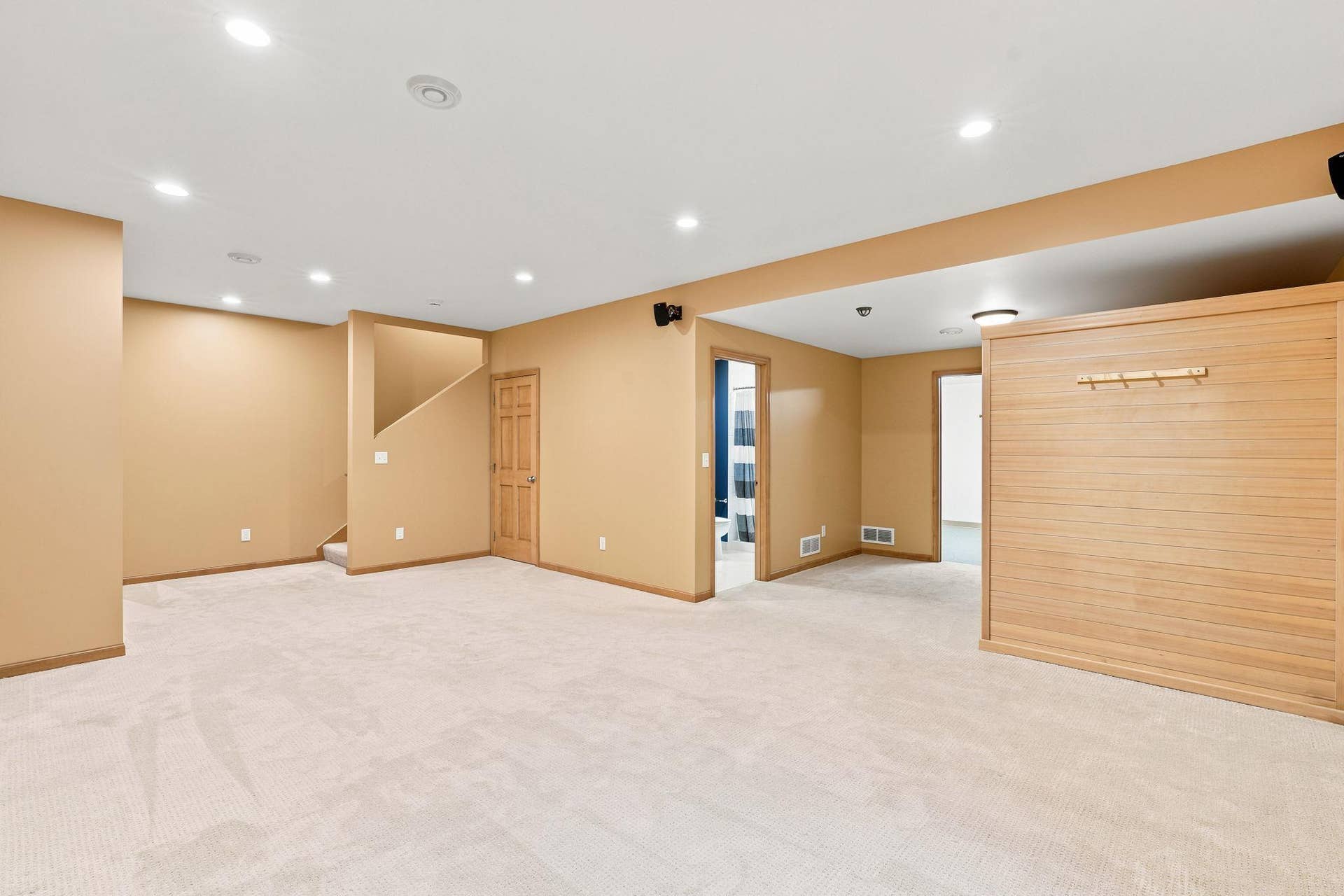 7143 Arthur Drive, Woodbury, MN 55125 Spacious fully finished lower level family room configured with surround sound system. Speakers and amplifier included.