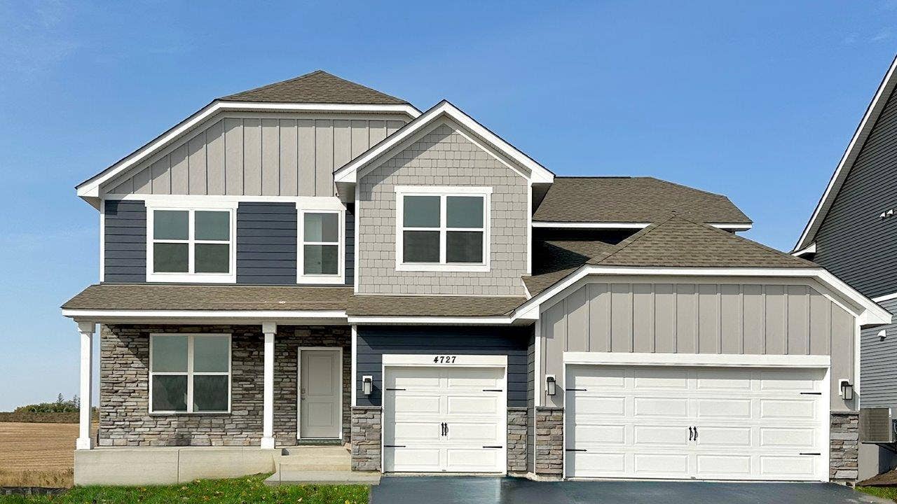 4774 Blake Court, Woodbury, MN 55129 Jordan C Rivertown Heights with stone.jpg