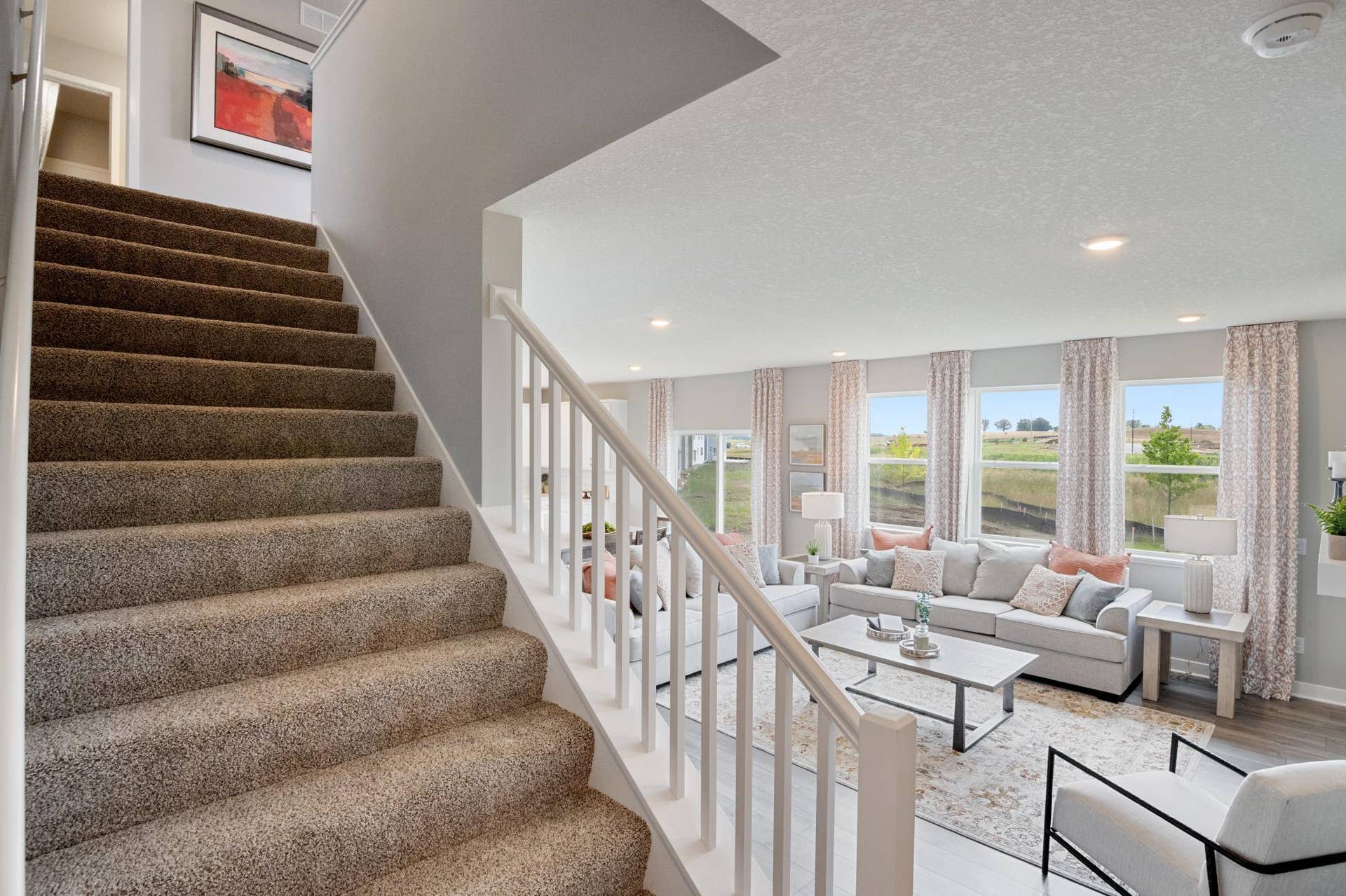 4774 Blake Court, Woodbury, MN 55129 Staircase is extra wide and makes moving furniture easy.