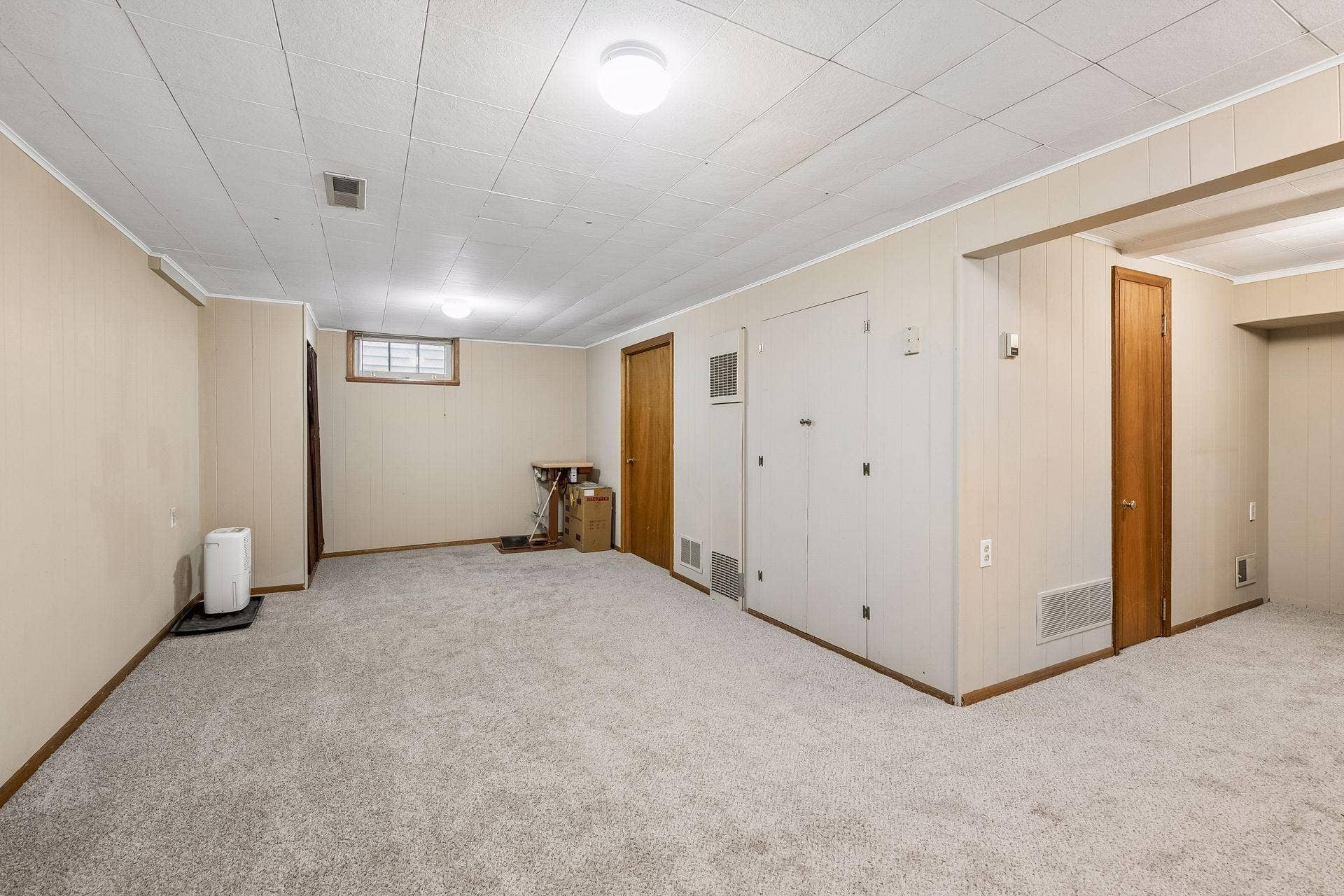 5625 42nd Avenue S, 56, Minneapolis, MN 55417 Large lower level family room with new carpet.