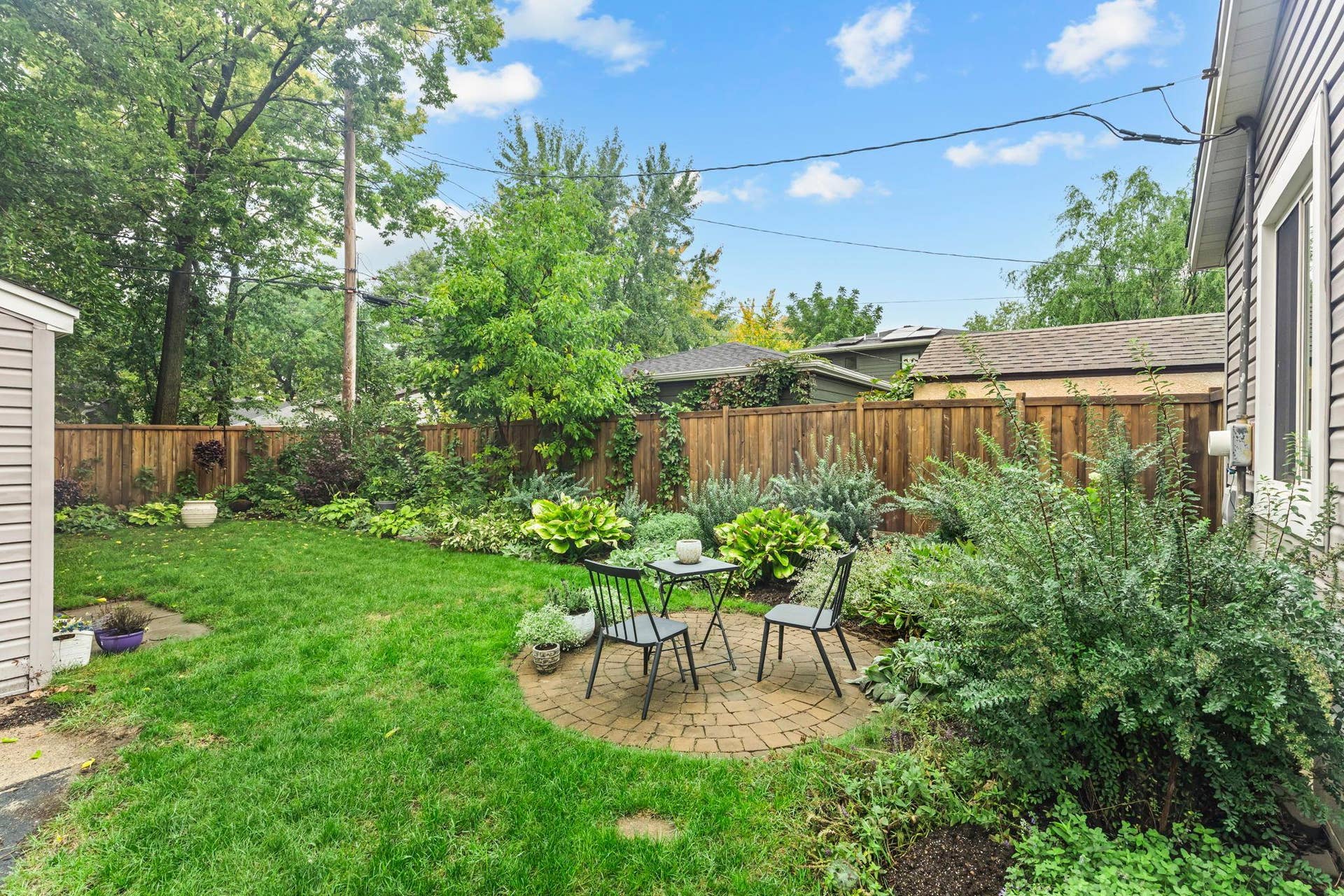 4414 42nd Avenue S, 32, Minneapolis, MN 55406 Outside, a paver patio and firepit create a natural gathering spot, while privacy fencing added in 2024 makes the outdoor space feel even more inviting.