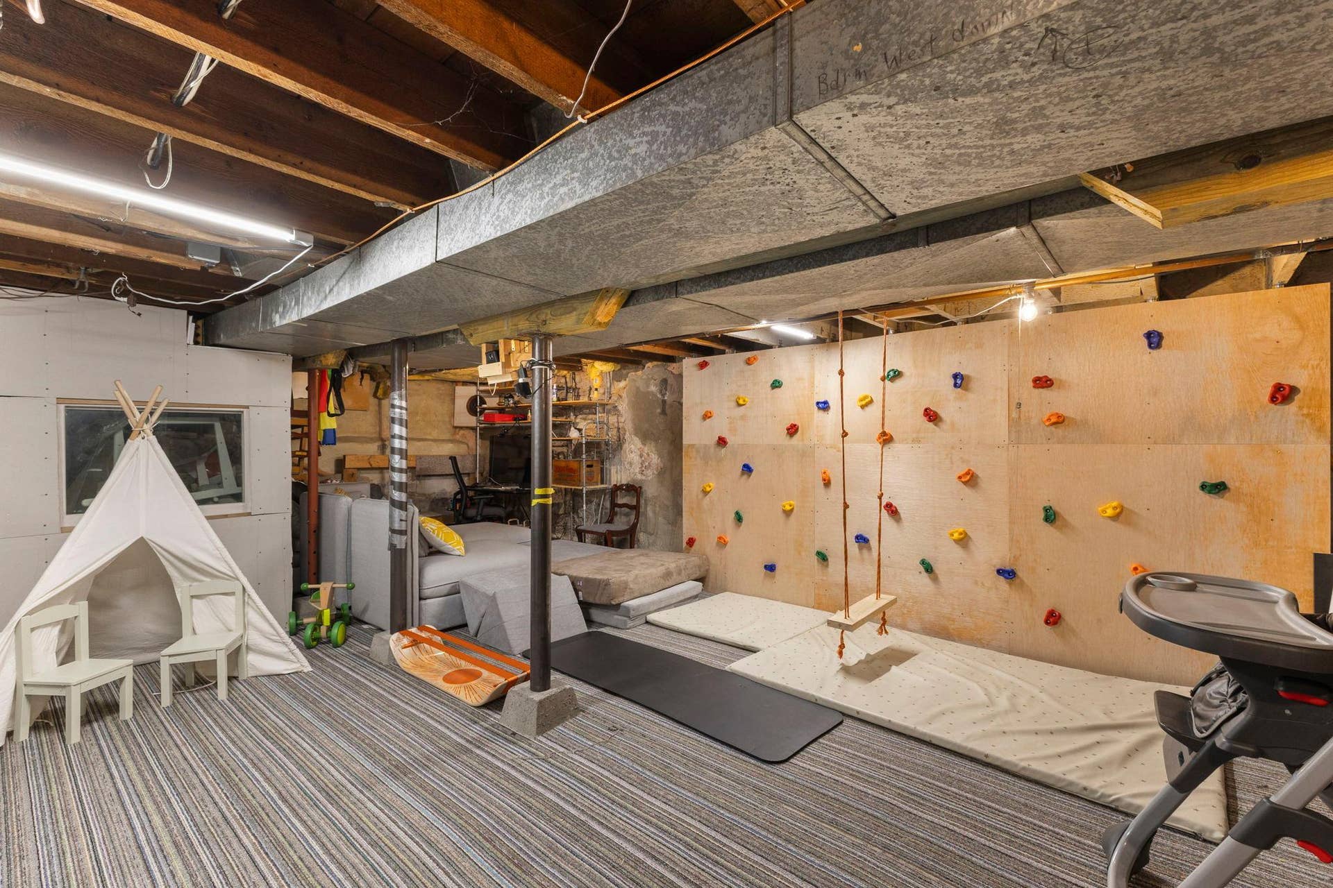 870 Randolph Avenue, 103, Saint Paul, MN 55102 Lower level features a play area with rock climbing wall for kids