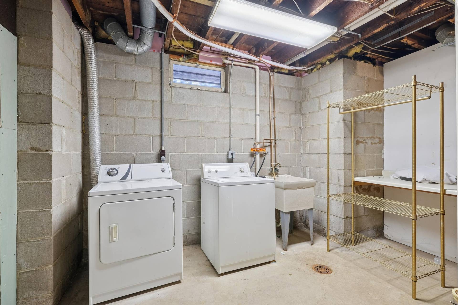 Separate laundry and utilities for both units and plenty of storage space.