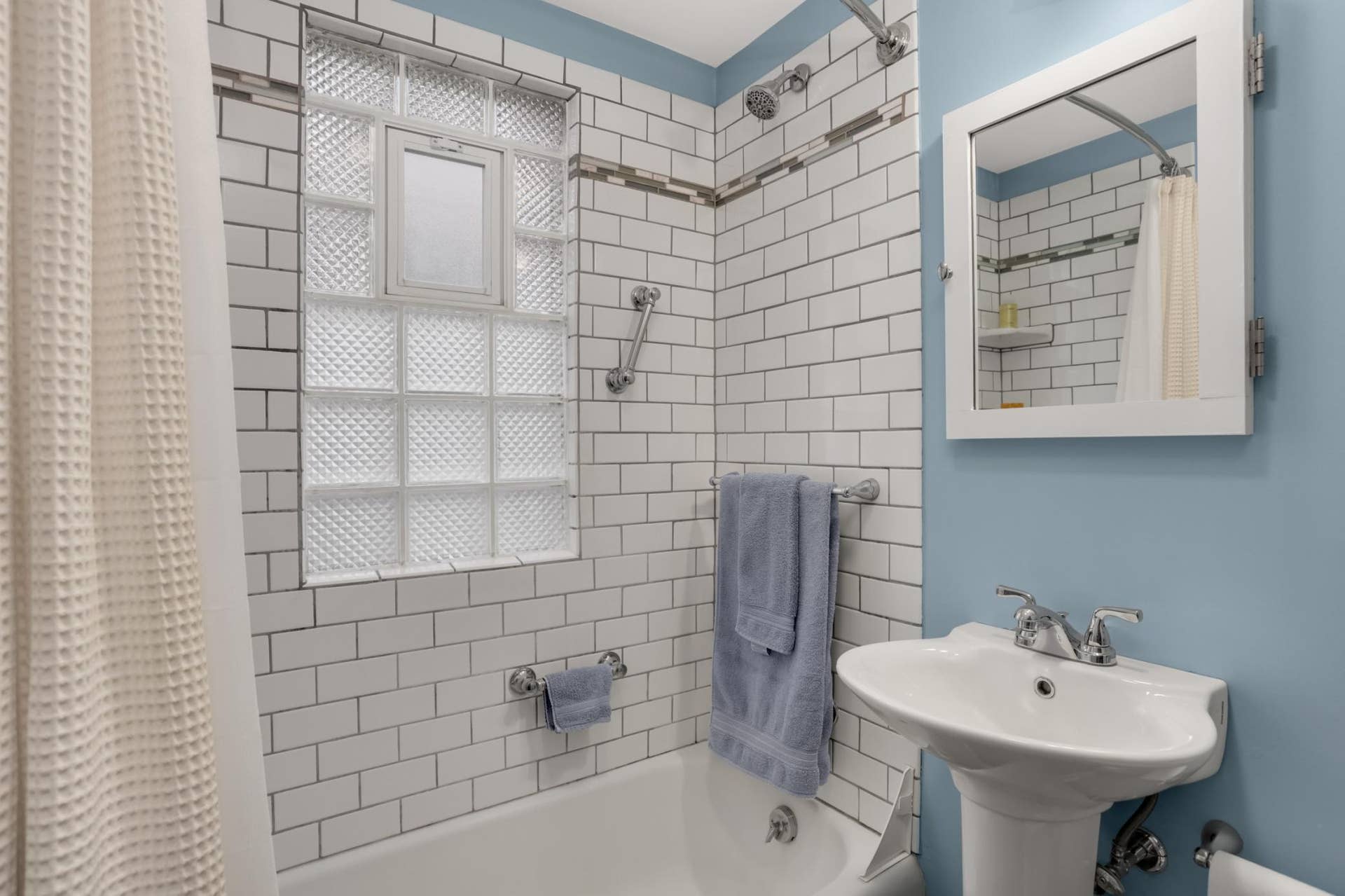 Updated main floor bathroom with beautiful tile