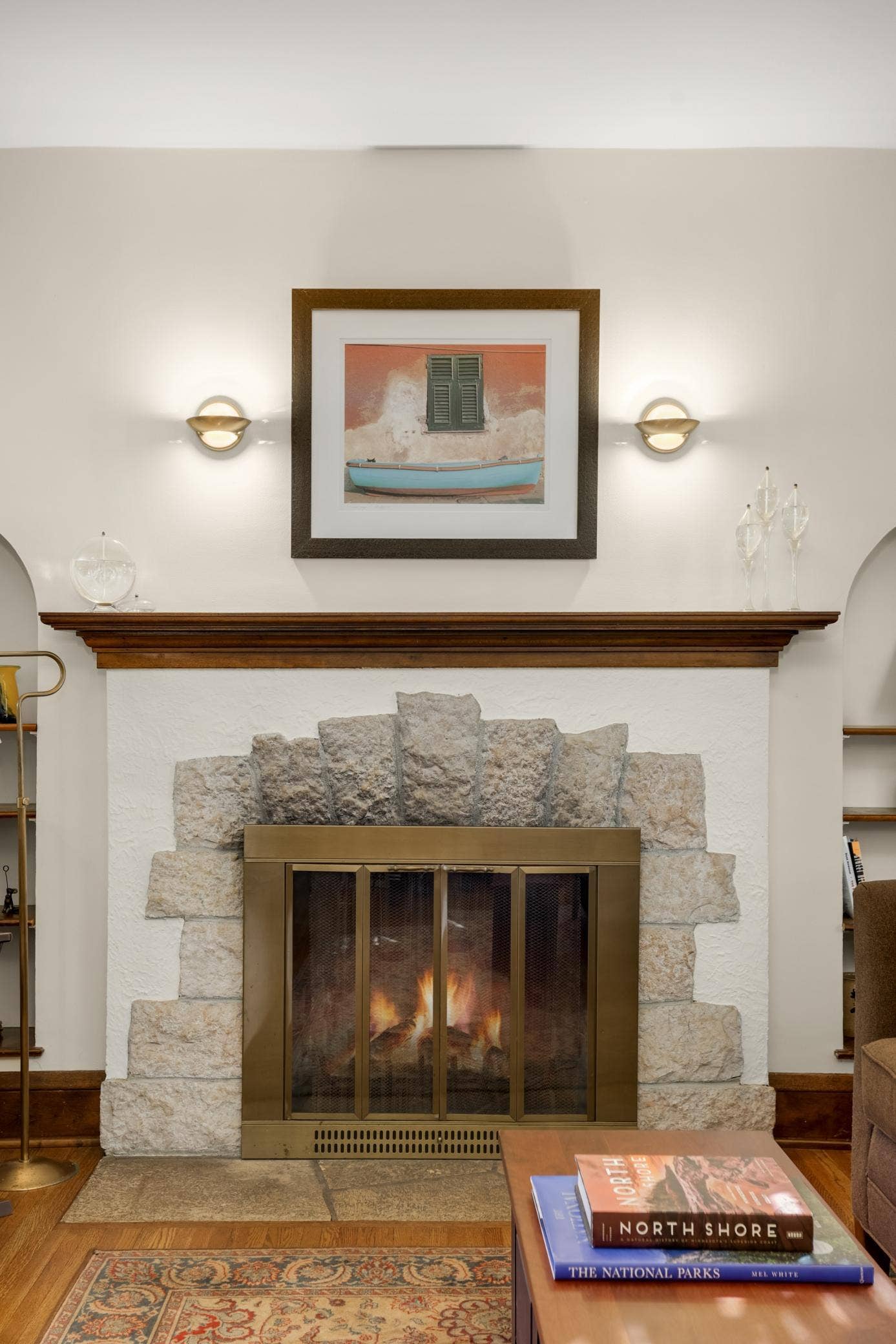 The centerpiece of the living room is this stunning fireplace