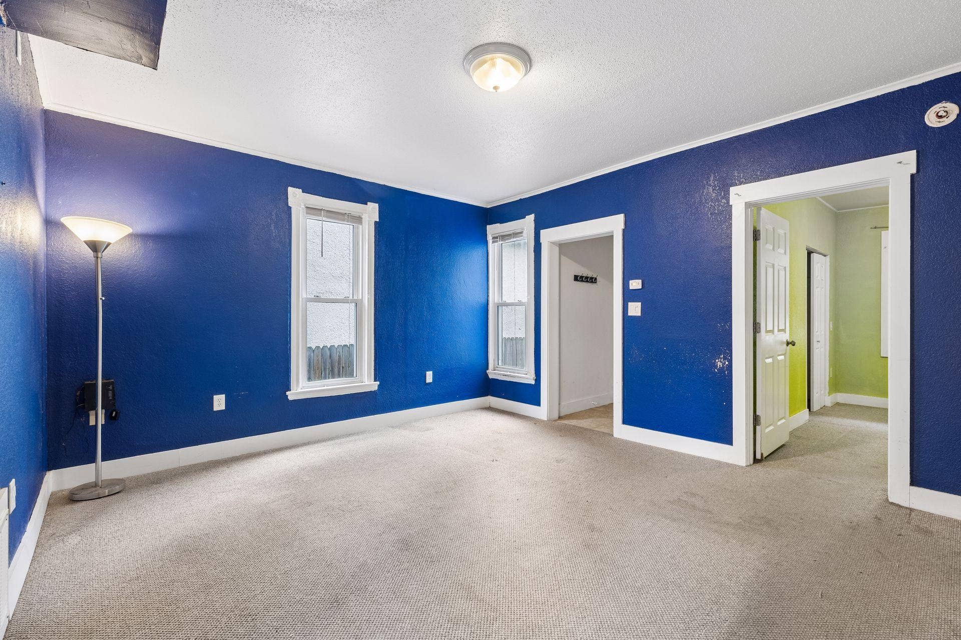 2533 Polk Street NE, 2, Minneapolis, MN 55418 Unit 2: The living room connects seamlessly to the main-floor bedroom and kitchen, creating an easy flow throughout the main level.