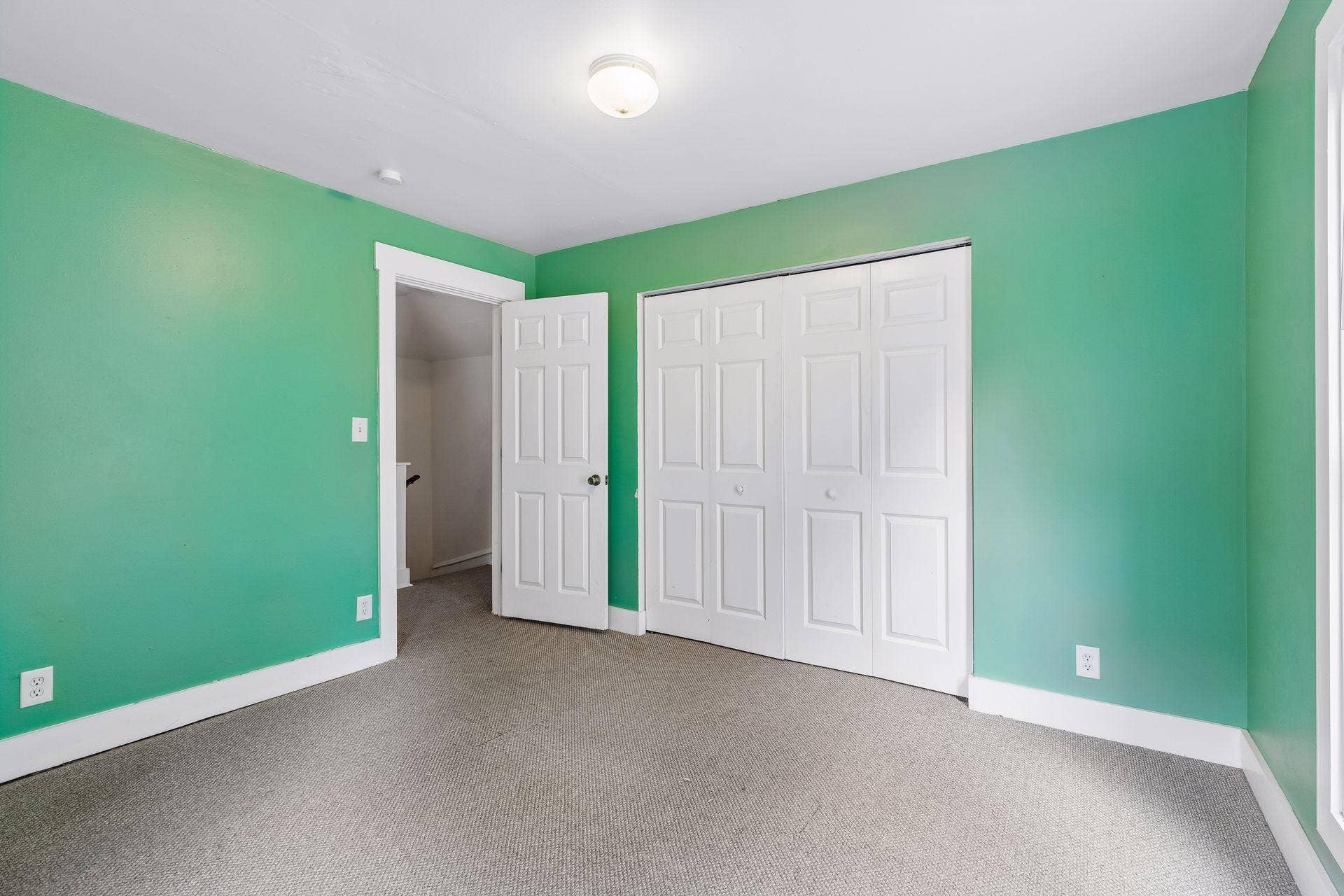 2533 Polk Street NE, 2, Minneapolis, MN 55418 Unit 2: A double closet adds ample storage for this second bedroom.
