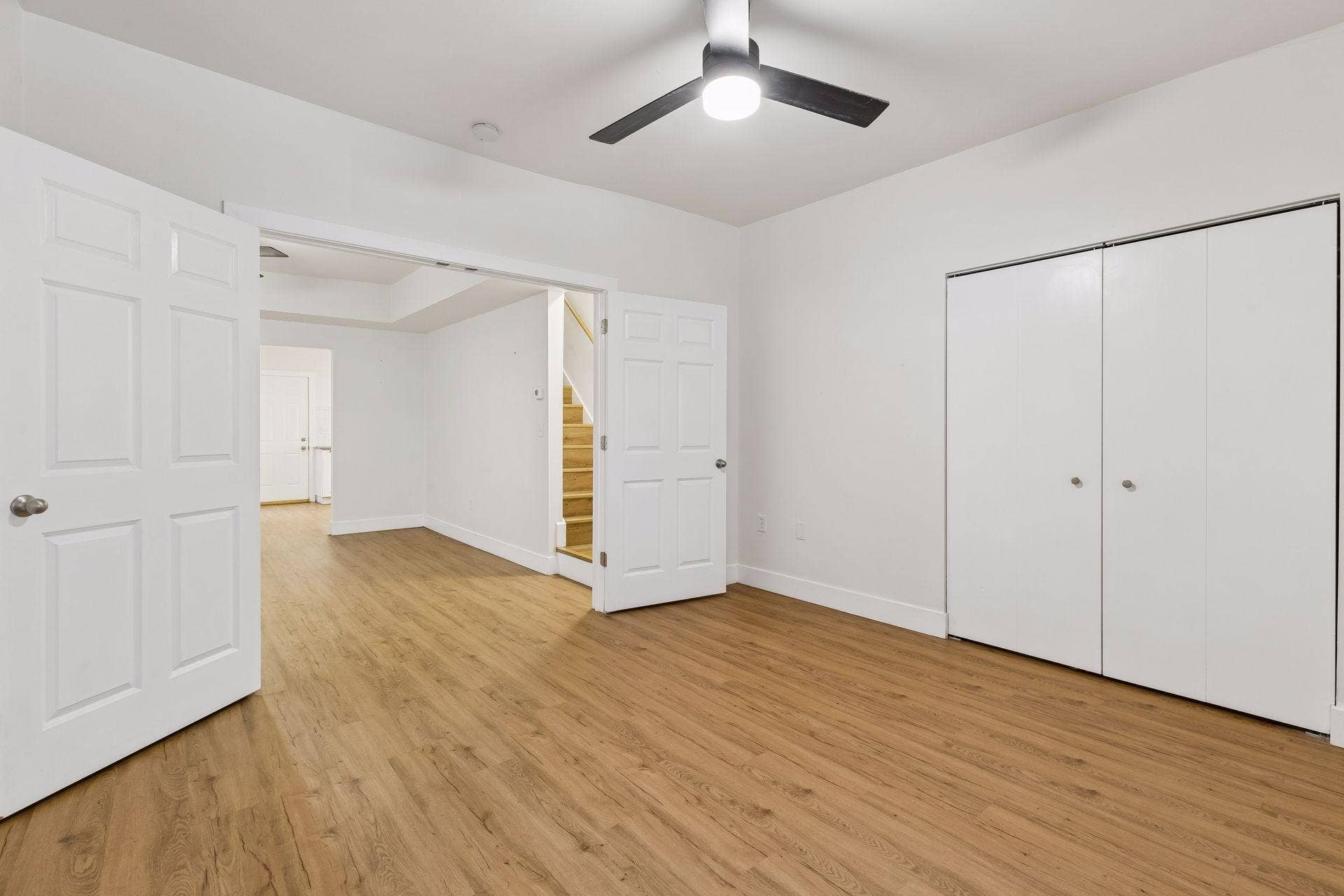 2533 Polk Street NE, 2, Minneapolis, MN 55418 Unit 1: A second view showcases the French doors and the spacious feel of this main-floor bedroom.