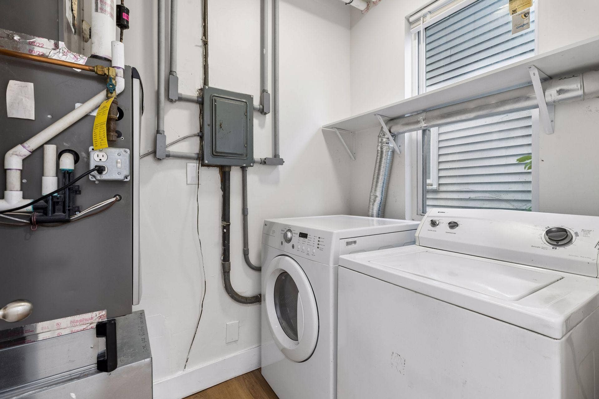2533 Polk Street NE, 2, Minneapolis, MN 55418 Unit 1: Laundry is right where you need it! The main-floor laundry and utility room is located just off the full bathroom.