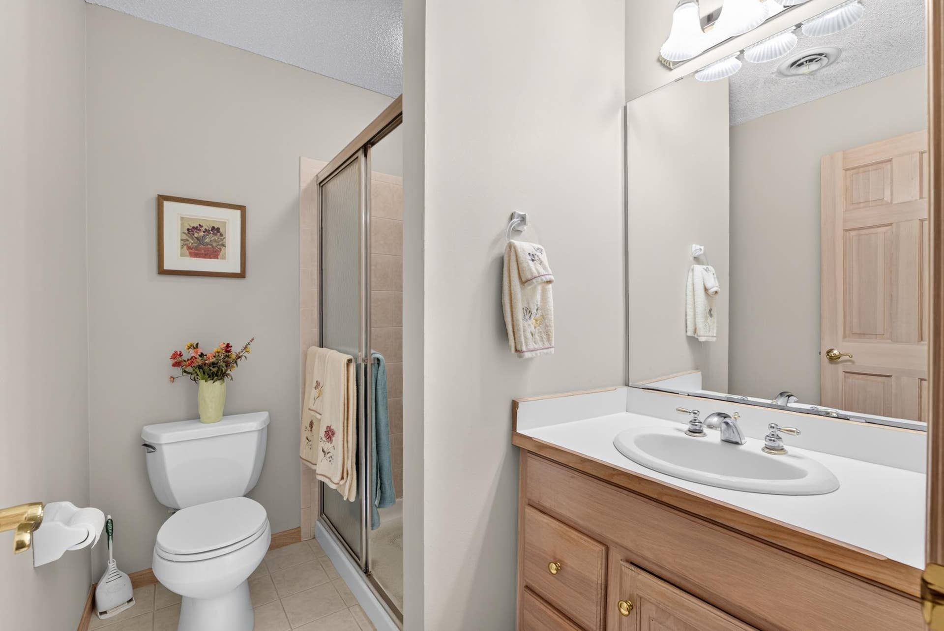 7982 Dunkirk Lane N, Maple Grove, MN 55311 Convenient lower-level bath for guests or family.