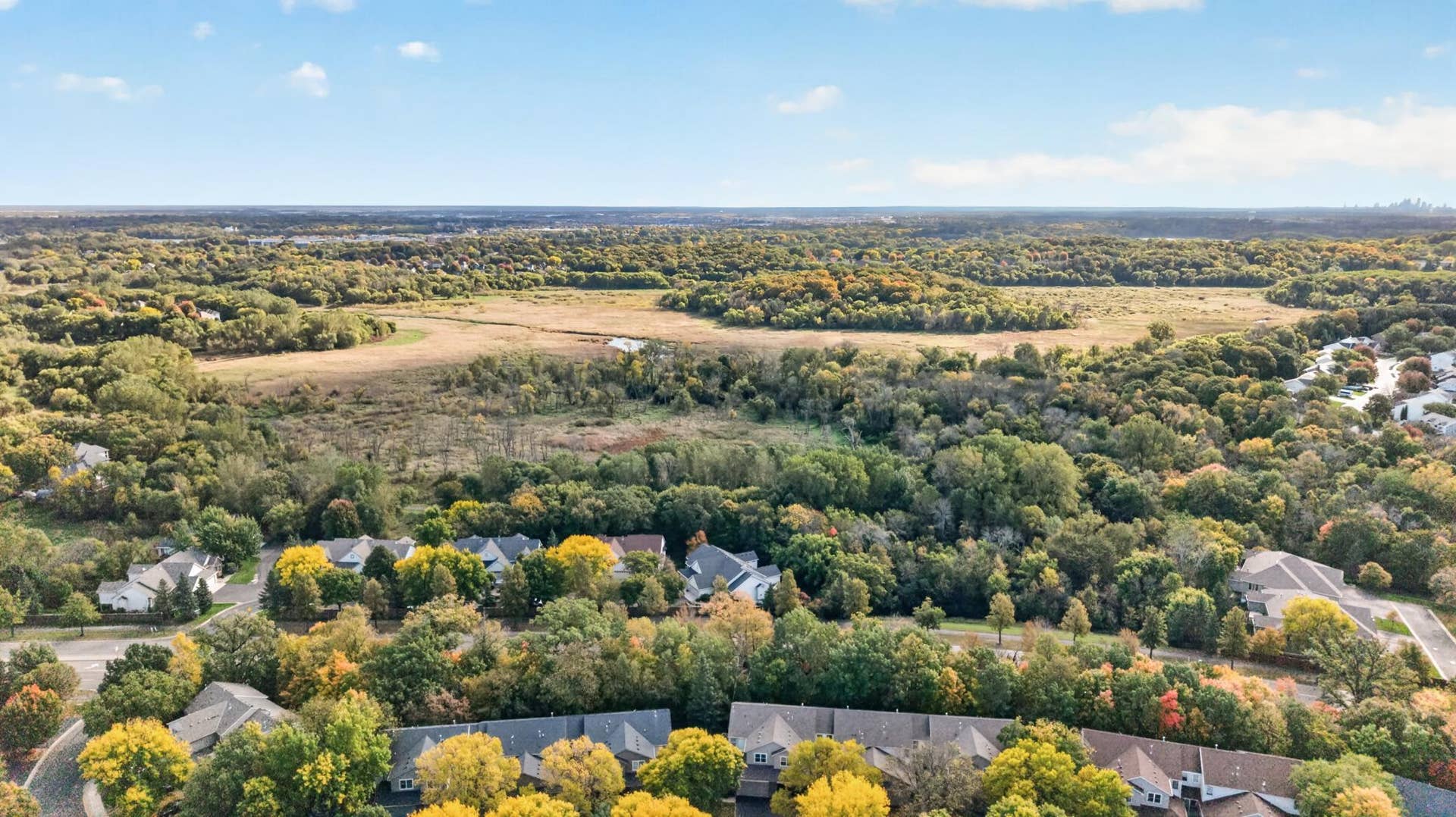 7982 Dunkirk Lane N, Maple Grove, MN 55311 Property backs to Medicine Lake Regional Trail and Elm Creek open area.
