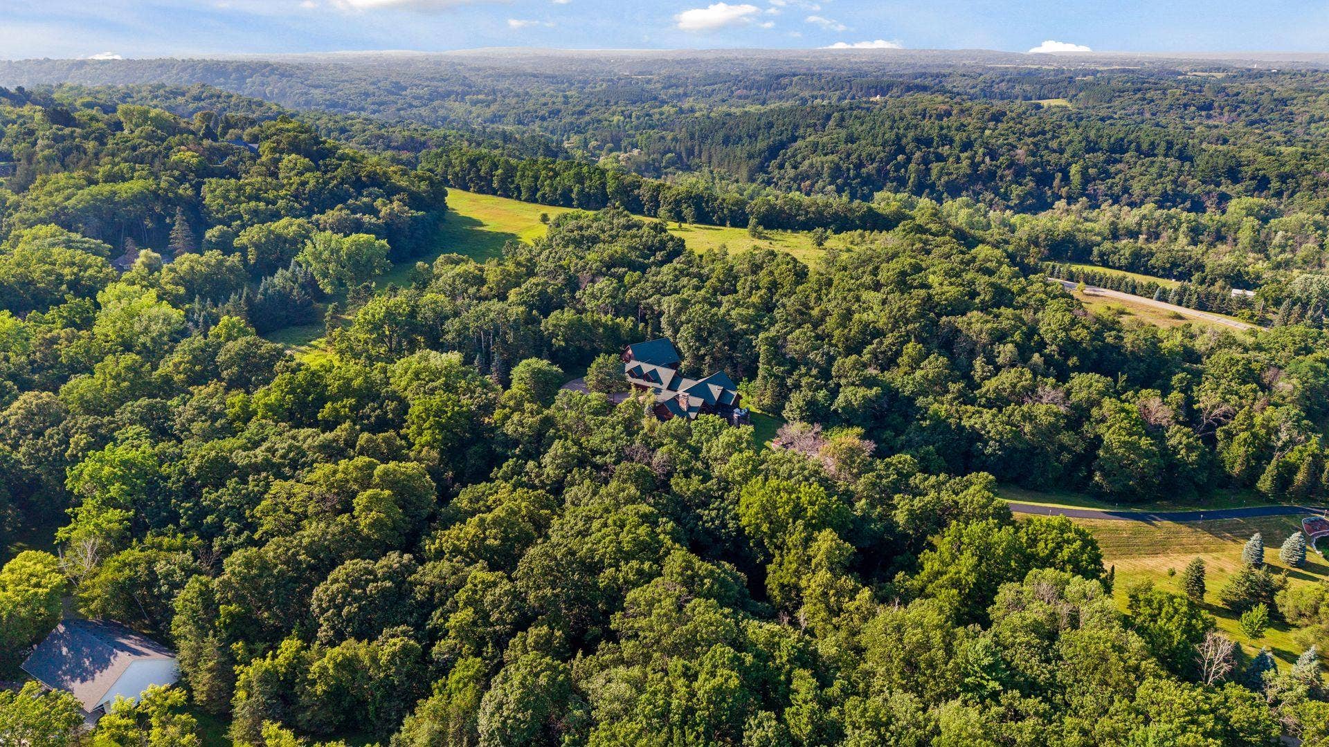 Aerial view of property with adjacent Belwin Conservancy land to the North.