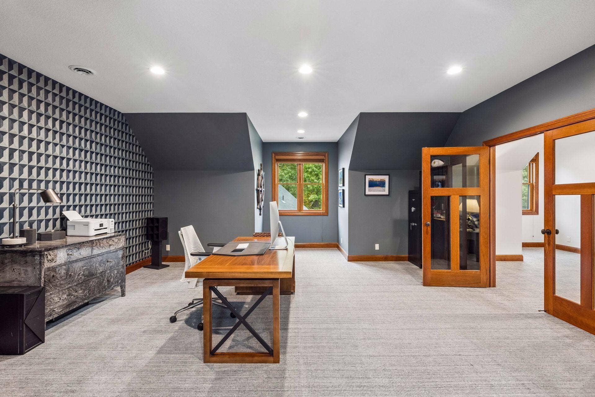 Office by day, guest room by night: this versatile fifth bedroom adapts to however you live