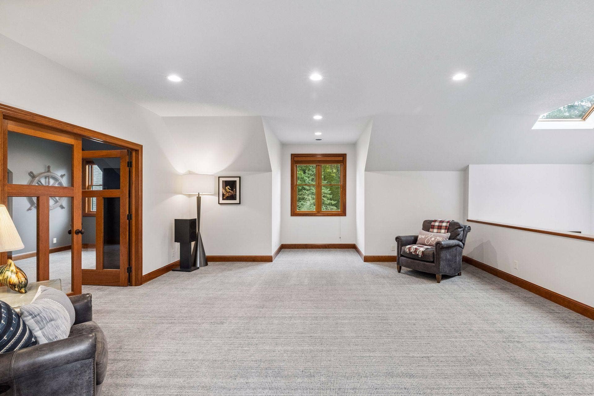 Flexible bonus room with skylight and dormer ceilings