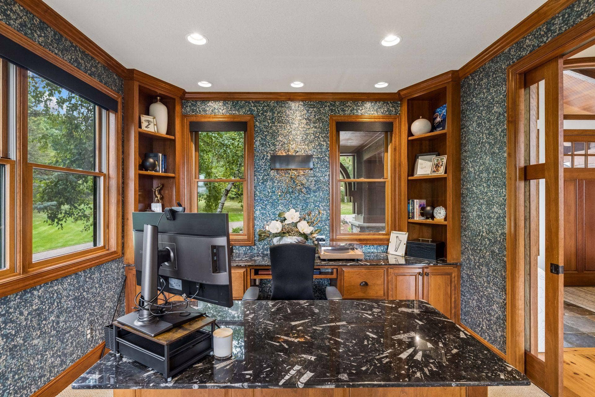 Step away to a private, designer-finished office, quiet yet close to the heart of the home