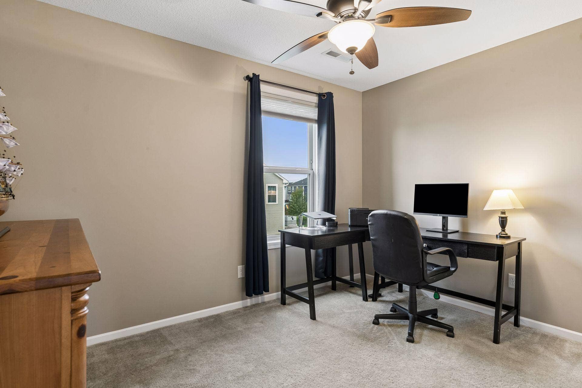 9135 Lighthouse Lane, Woodbury, MN 55129 Bed #2 utilized as a second flex space, but has plenty of room for a bed.