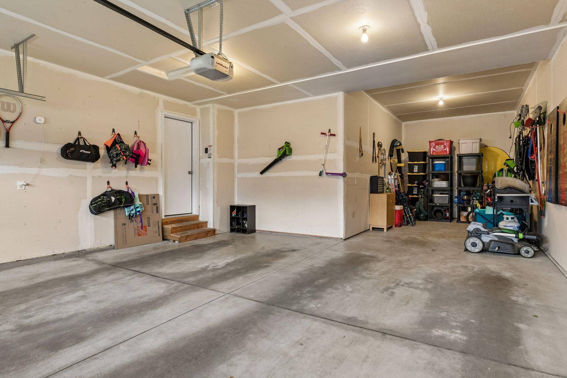 9135 Lighthouse Lane, Woodbury, MN 55129 3 Car tandem stall garage