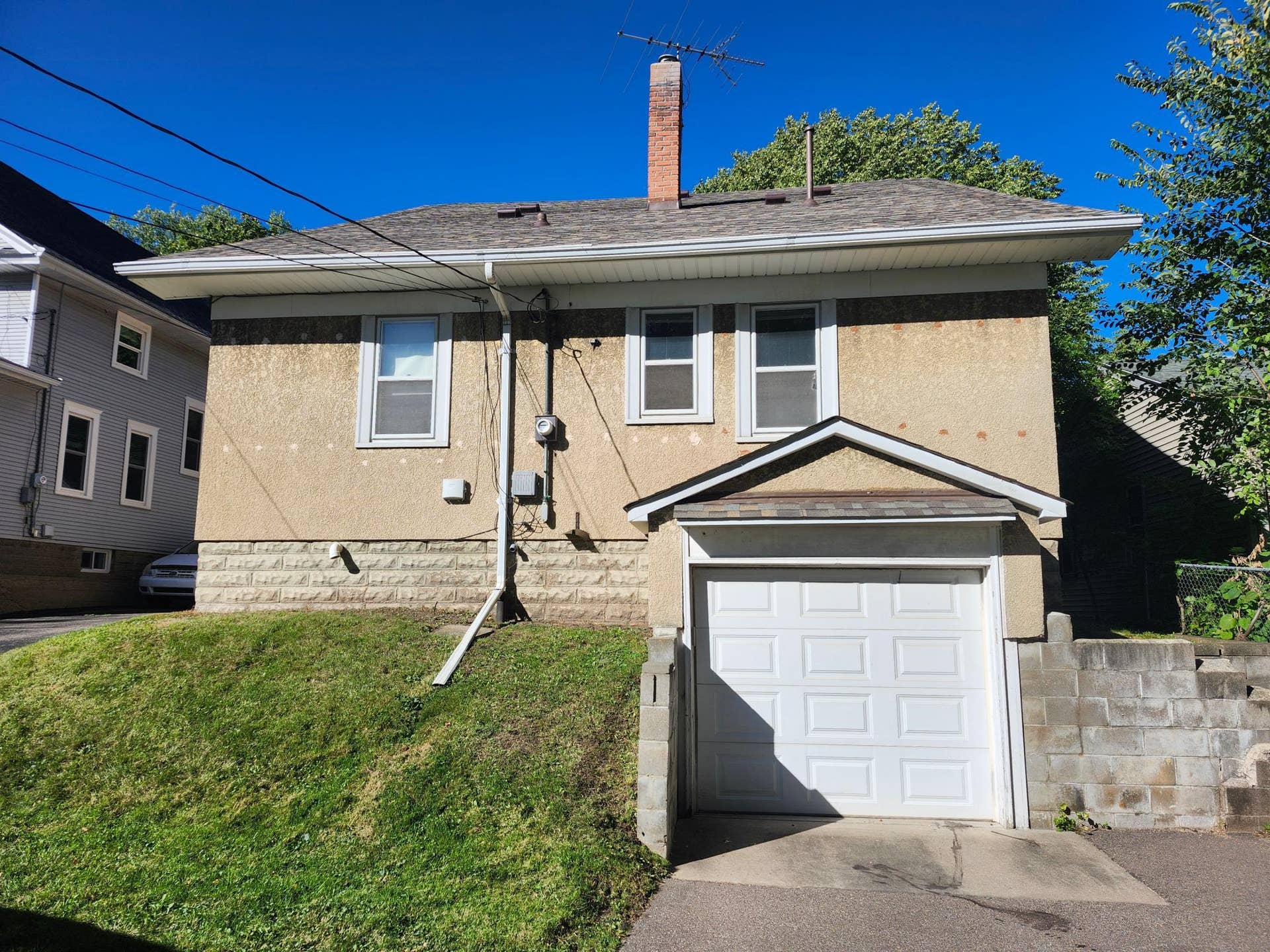690 Ohio Street, 104, Saint Paul, MN 55107 Back of home and garage.jpg