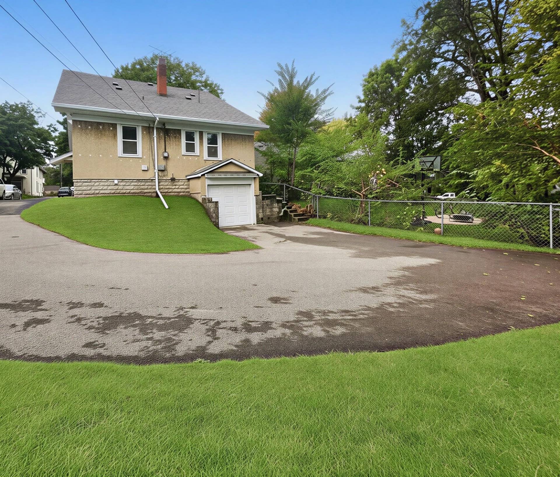 690 Ohio Street, 104, Saint Paul, MN 55107 Back Yard and Driveway.jpg