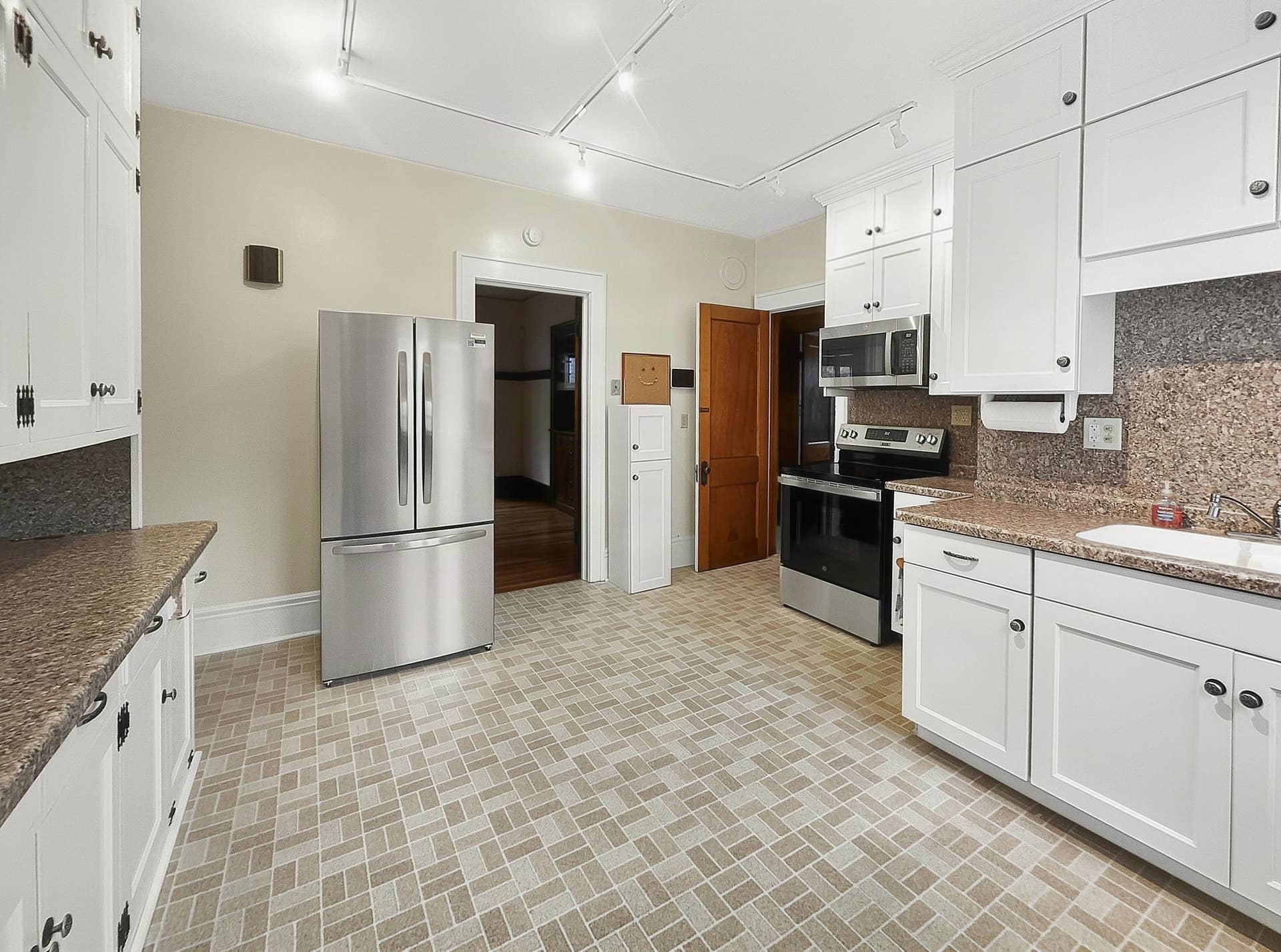 690 Ohio Street, 104, Saint Paul, MN 55107 Large Kitchen with New Appliances, cabinets, countertops and sink. Plus room for a center Island.jpg