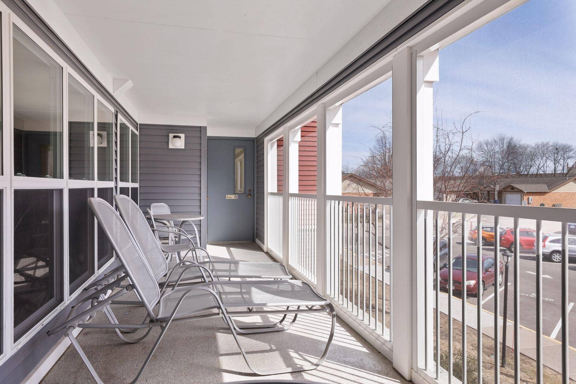 720 3rd Avenue NE, #120, 71, Minneapolis, MN 55413 The screened-in porch with plenty of space to lounge.